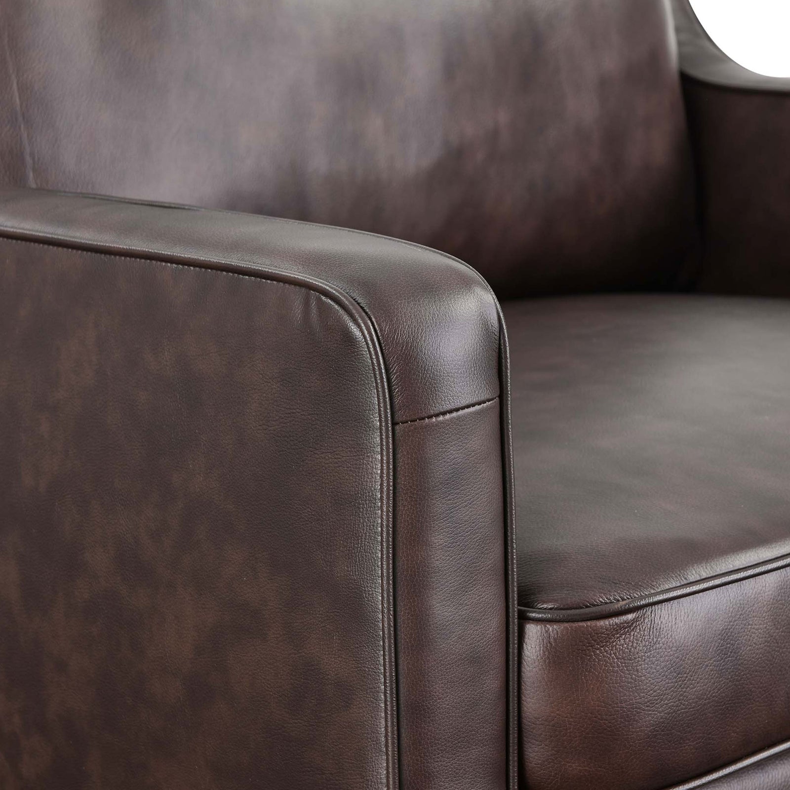 Supple top-grain leather with refined French piping and smooth, soft-touch texture || EEI-5555-BRN || detail_studio