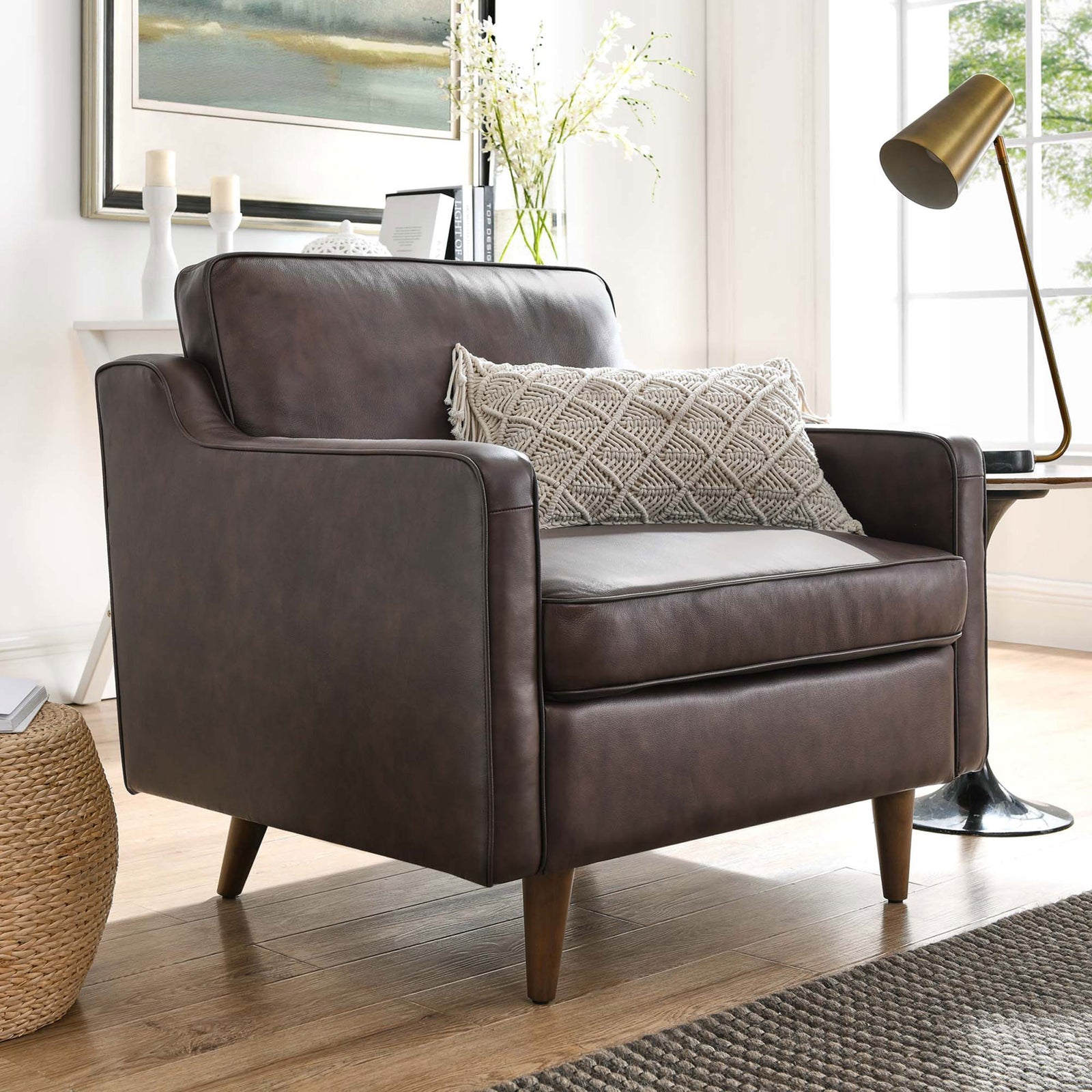 Brown leather armchair styled for everyday lounging with plush cushions and tapered wood legs || EEI-5555-BRN || front_angle_room