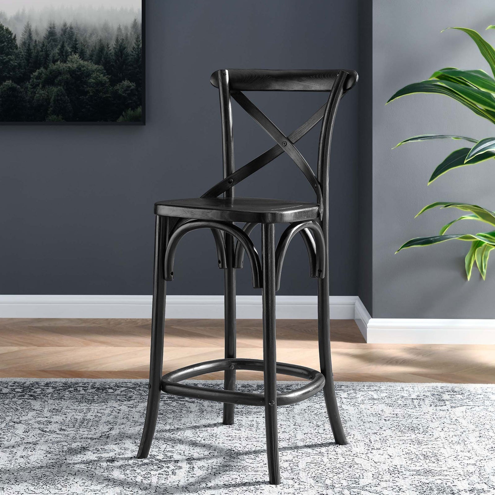 Counter-height design elevates casual dining with a classic x-back and rounded footrest || EEI-5562-BLK || front_angle_room