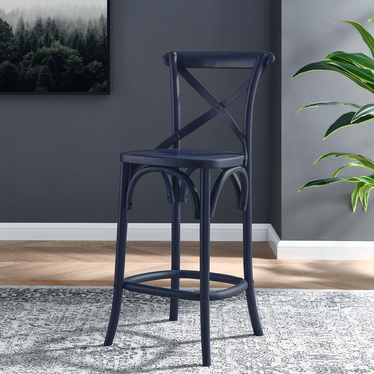 Elevate kitchen counters with a midnight blue stool featuring a supportive X-back and footrest. || EEI-5562-MID || front_angle_room