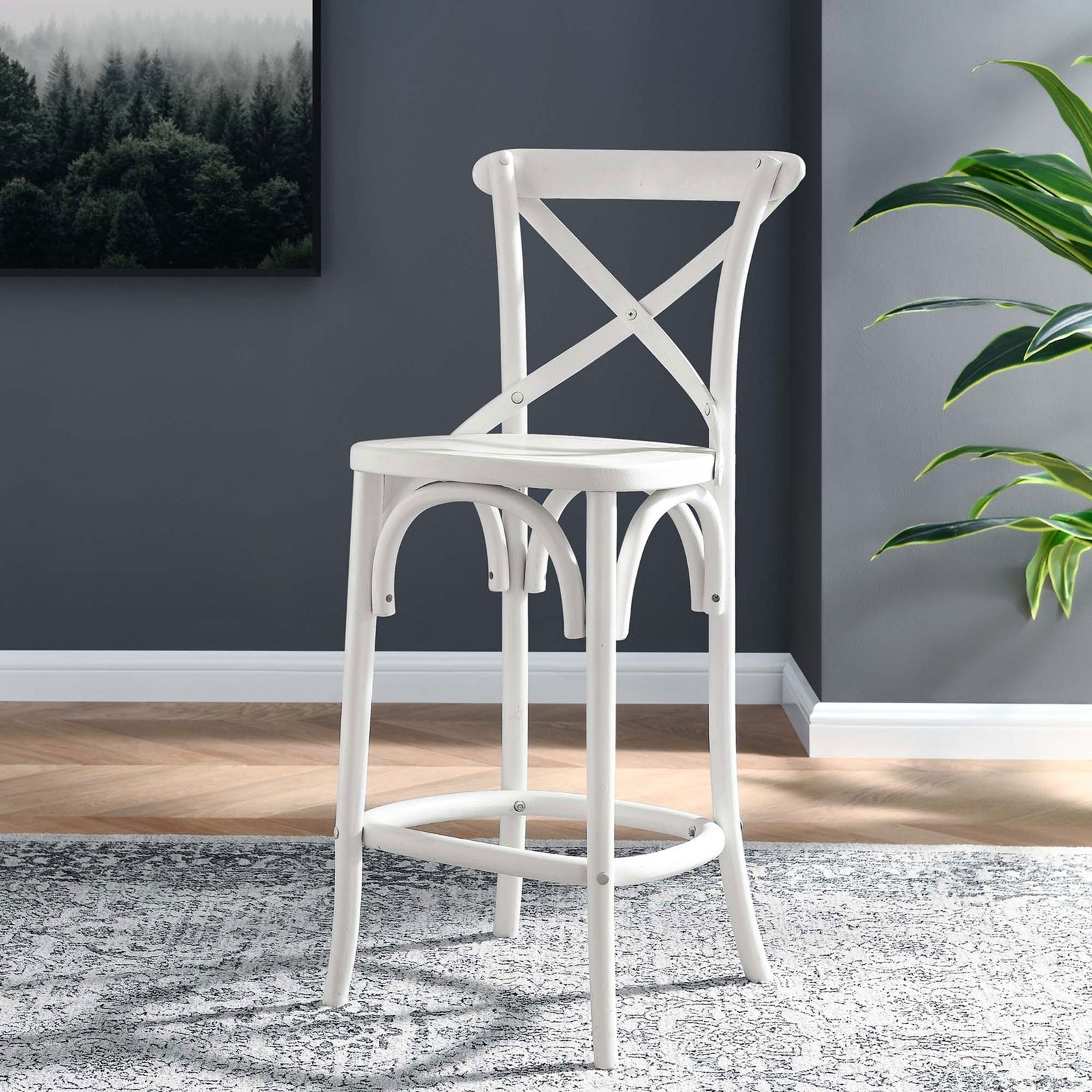 White counter stool adds modern farmhouse charm to the kitchen with its X-back and curved footrest || EEI-5562-WHI || front_angle_room