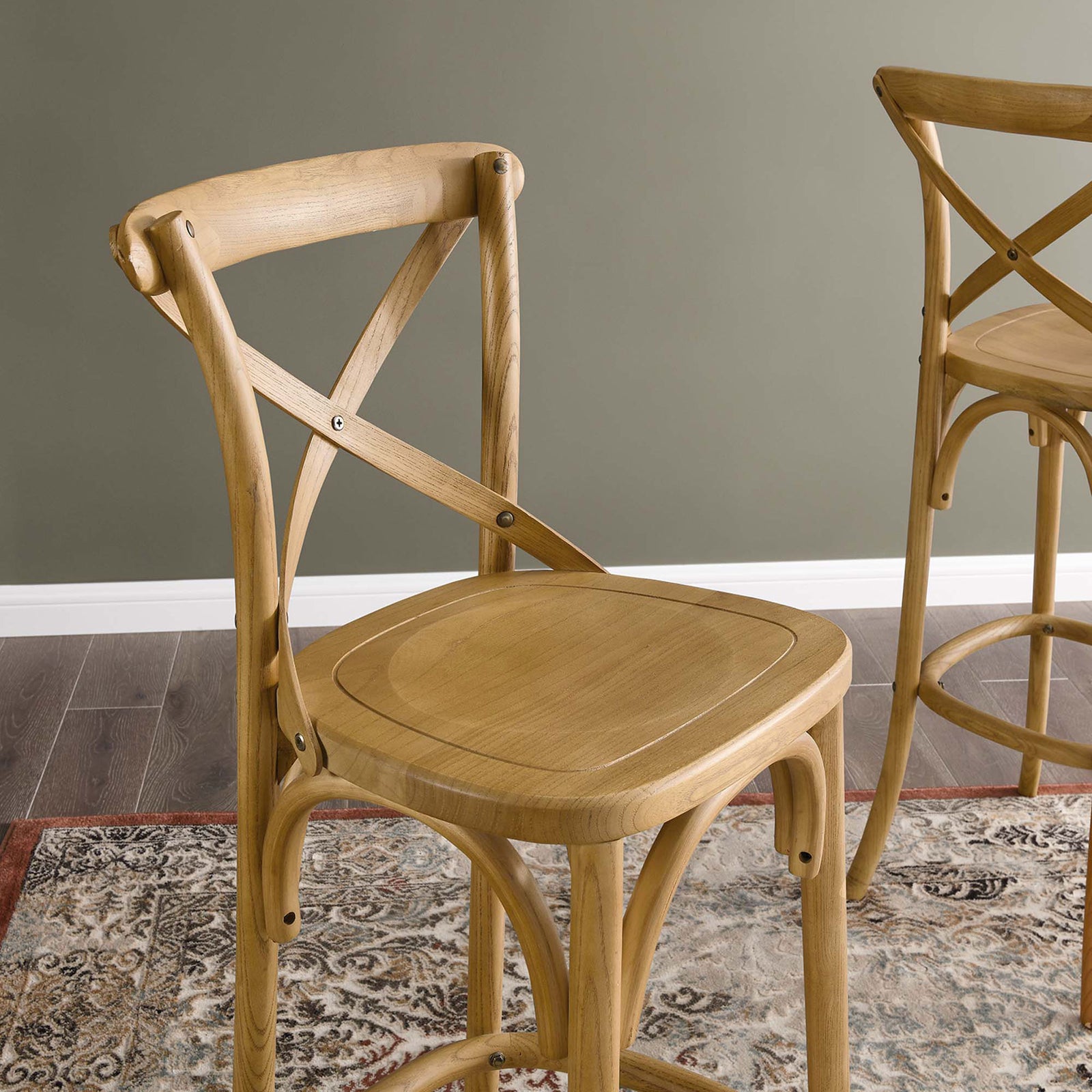 Wood seat detail reveals rich grain and rounded edging over patterned rug || EEI-5563-NAT || detail_room