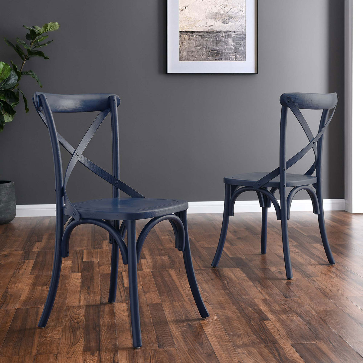 Pair of midnight blue dining chairs in a modern dining space, showing both front and back views || EEI-5564-MID || front_angle_room
