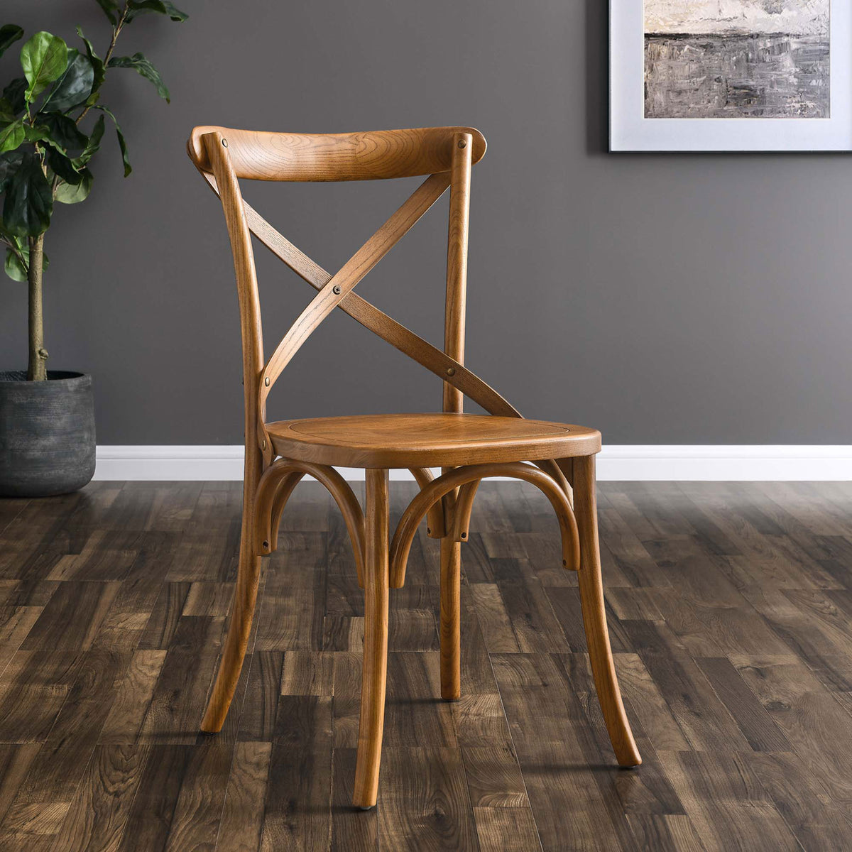 Walnut Gear dining chair styled in a contemporary dining room with wood floors and wall art || EEI-5564-WAL || front_angle_room