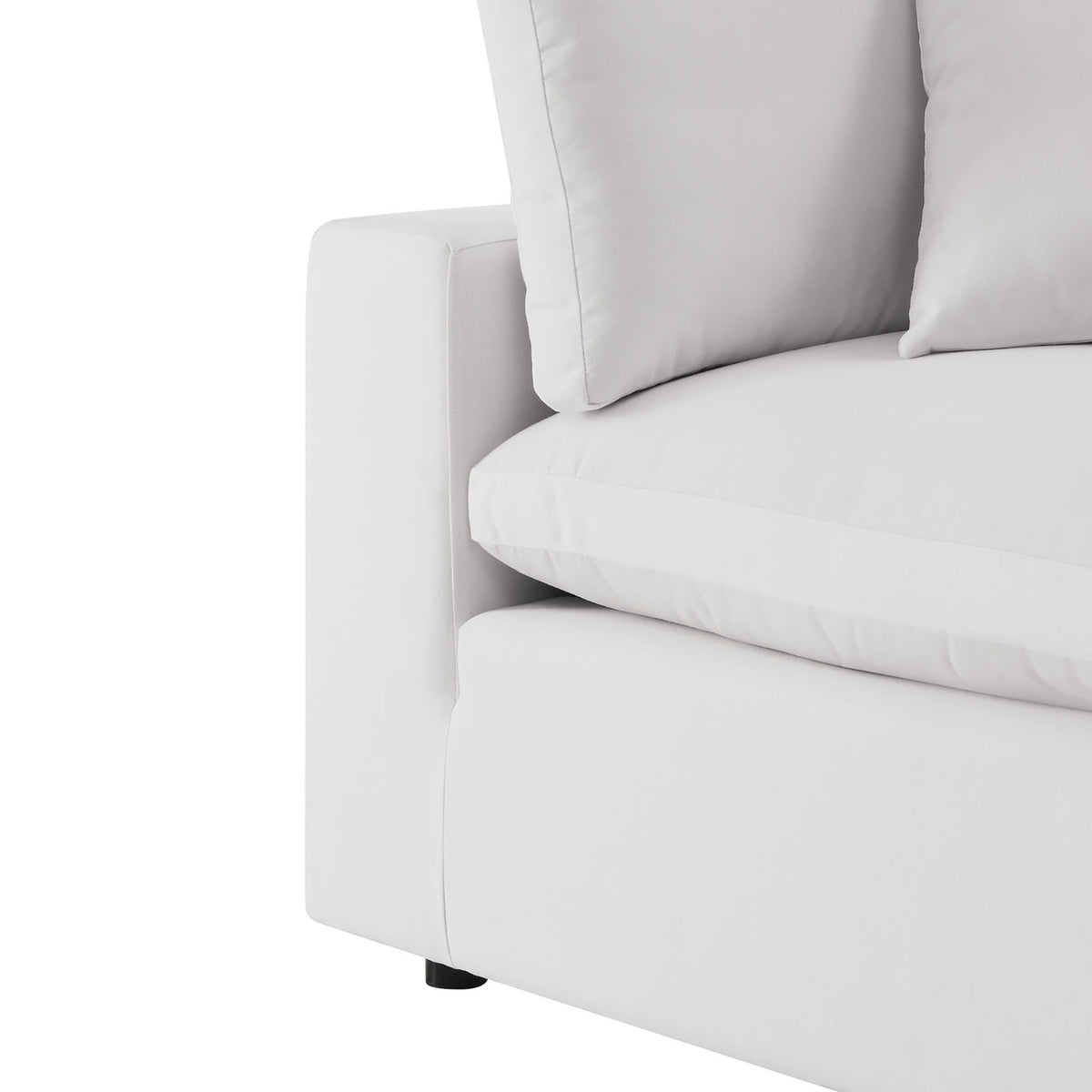 Soft white upholstery and smooth track arm detailing emphasize the sectional's clean look. || EEI-5587-WHI || detail_studio