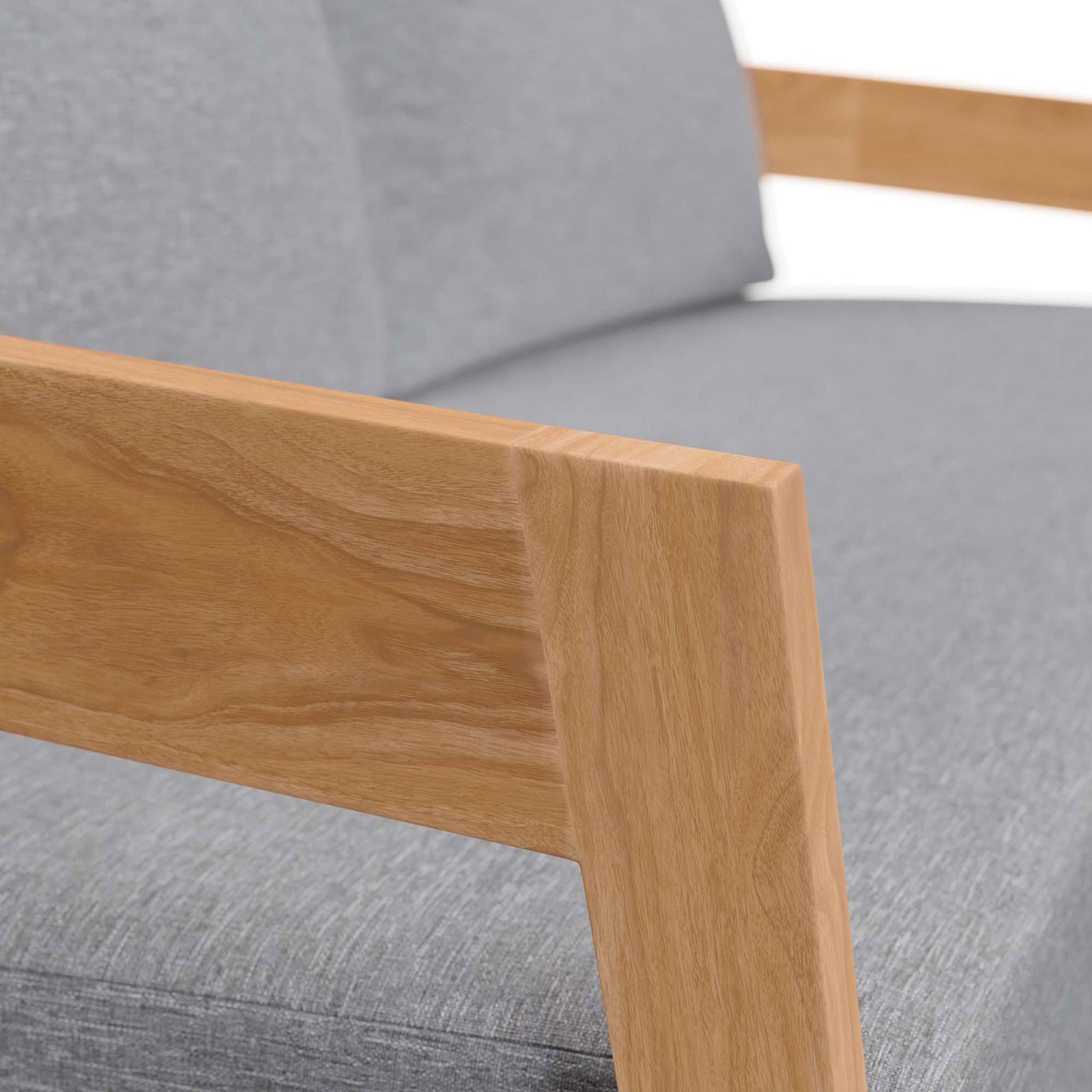 Smooth teak wood grain pairs with soft gray upholstery on the Brisbane loveseat arm || EEI-5601-NAT-GRY || detail_studio