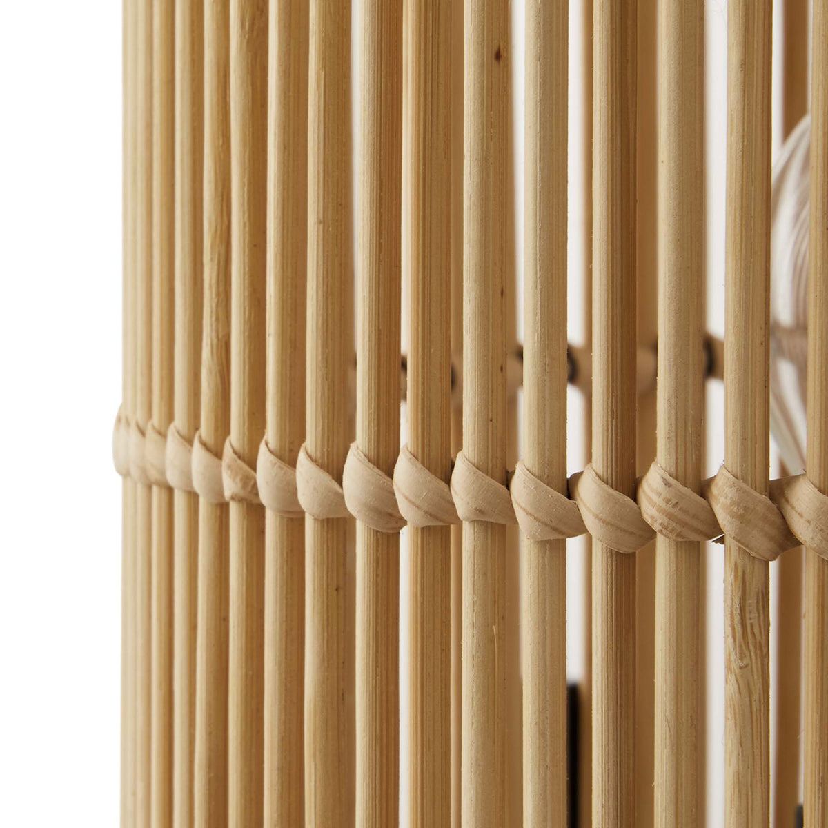 Natural bamboo rods woven in a cylindrical pattern highlighting the warm organic texture of the shade || EEI-5610-NAT || swatch_studio