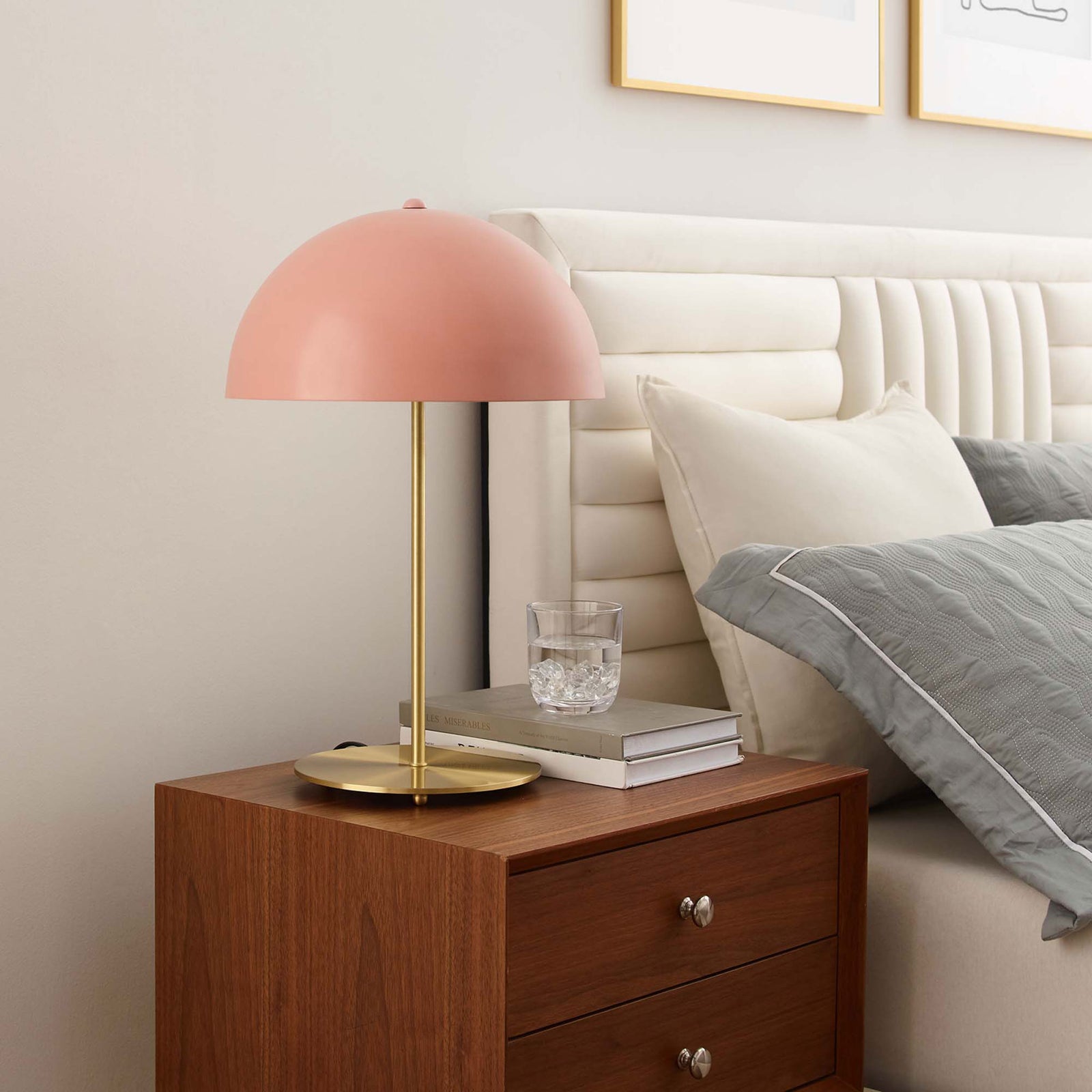 Pink dome table lamp on a wood nightstand adding a soft pop of color beside the bed || EEI-5629-PNK-SBR || front_angle_room
