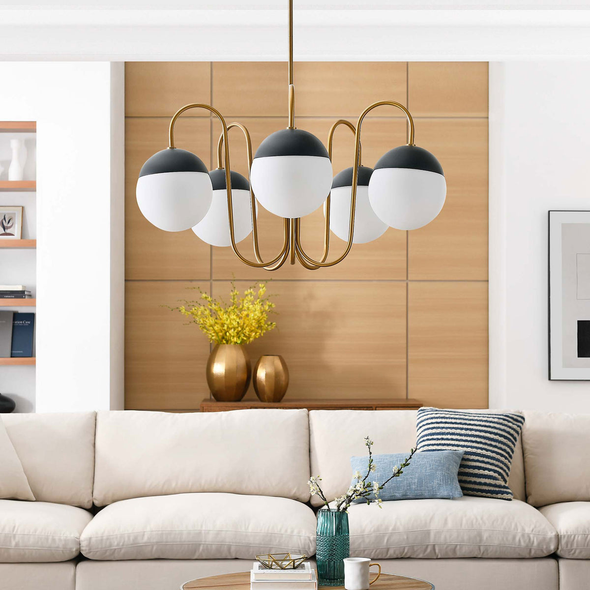 Five opal globes and satin brass curves bring sculptural modern style to the living room || EEI-5658-OPA-SBR || front_room