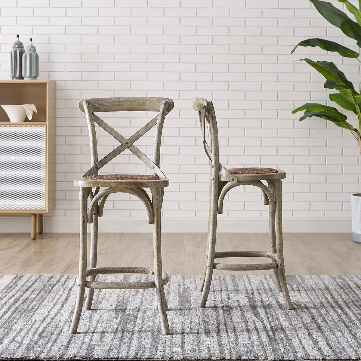 Versatile counter seating displays weathered gray wood, curved stretchers, and a woven rattan seat || EEI-5667-GRY || front_angle_room