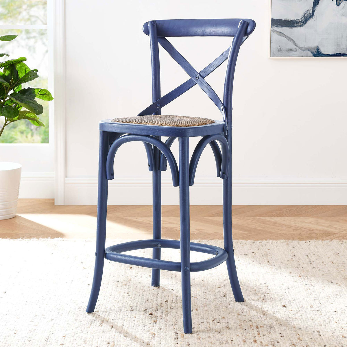 Elevate the kitchen with a midnight blue counter stool crafted from sturdy elm wood with rattan seat. || EEI-5667-MID || front_angle_room