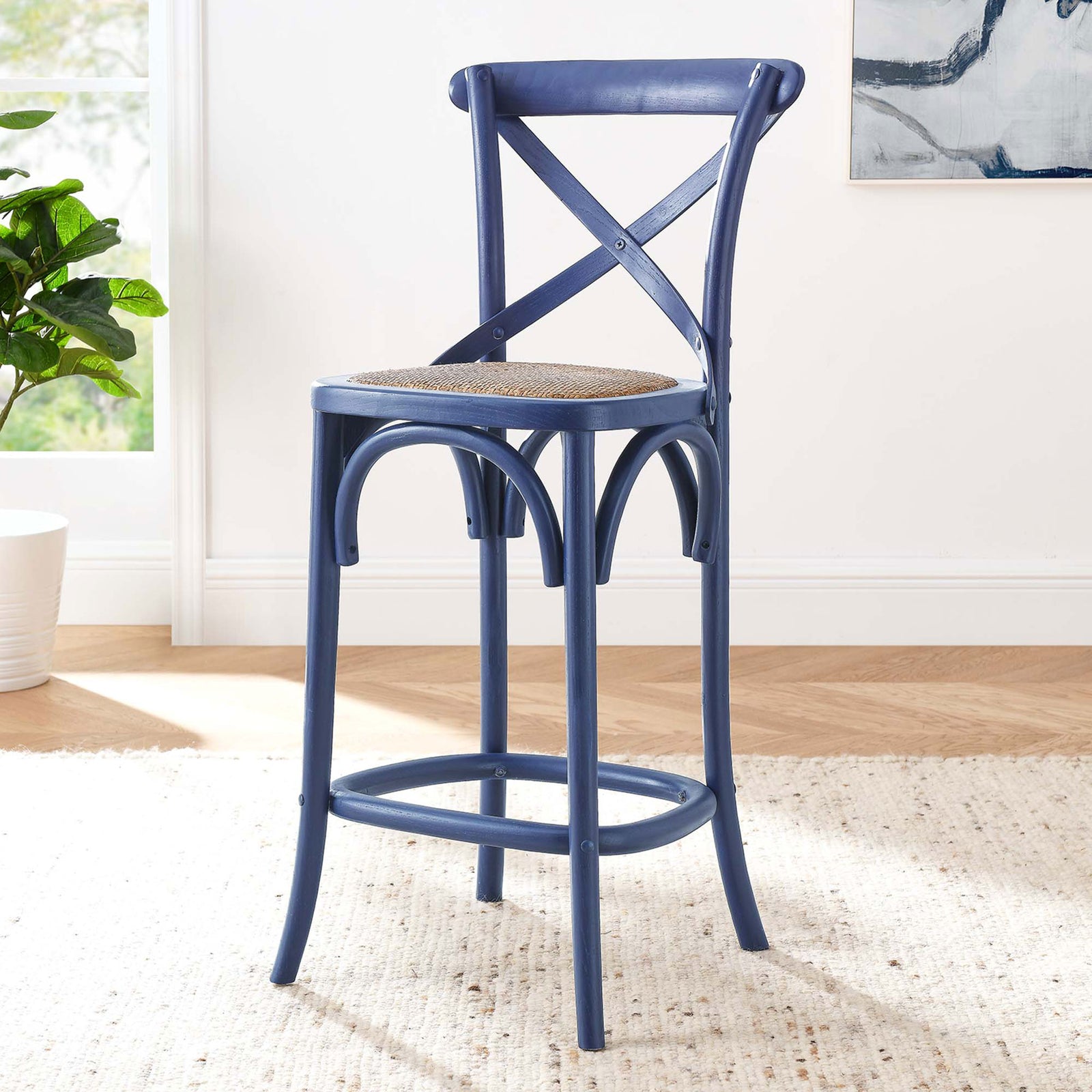 Elevate the kitchen with a midnight blue counter stool crafted from sturdy elm wood with rattan seat. || EEI-5667-MID || front_angle_room