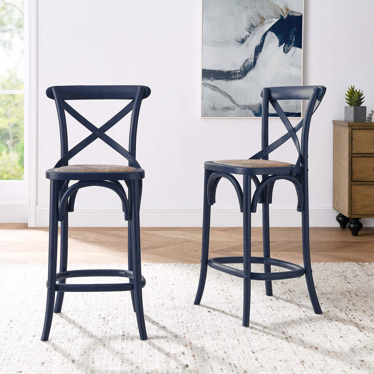 Style your space with two coordinating counter stools in midnight blue with natural rattan seats. || EEI-5667-MID || front_angle_room