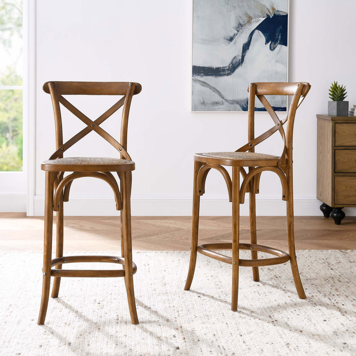 Warm walnut finish and rattan seat bring welcoming farmhouse style to the counter || EEI-5667-WAL || front_angle_room
