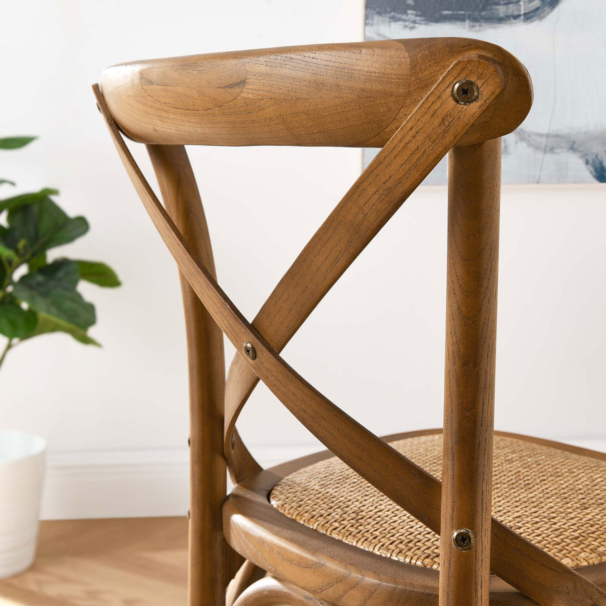 Refined X-back detail in walnut adds character to casual counter seating || EEI-5667-WAL || detail_room