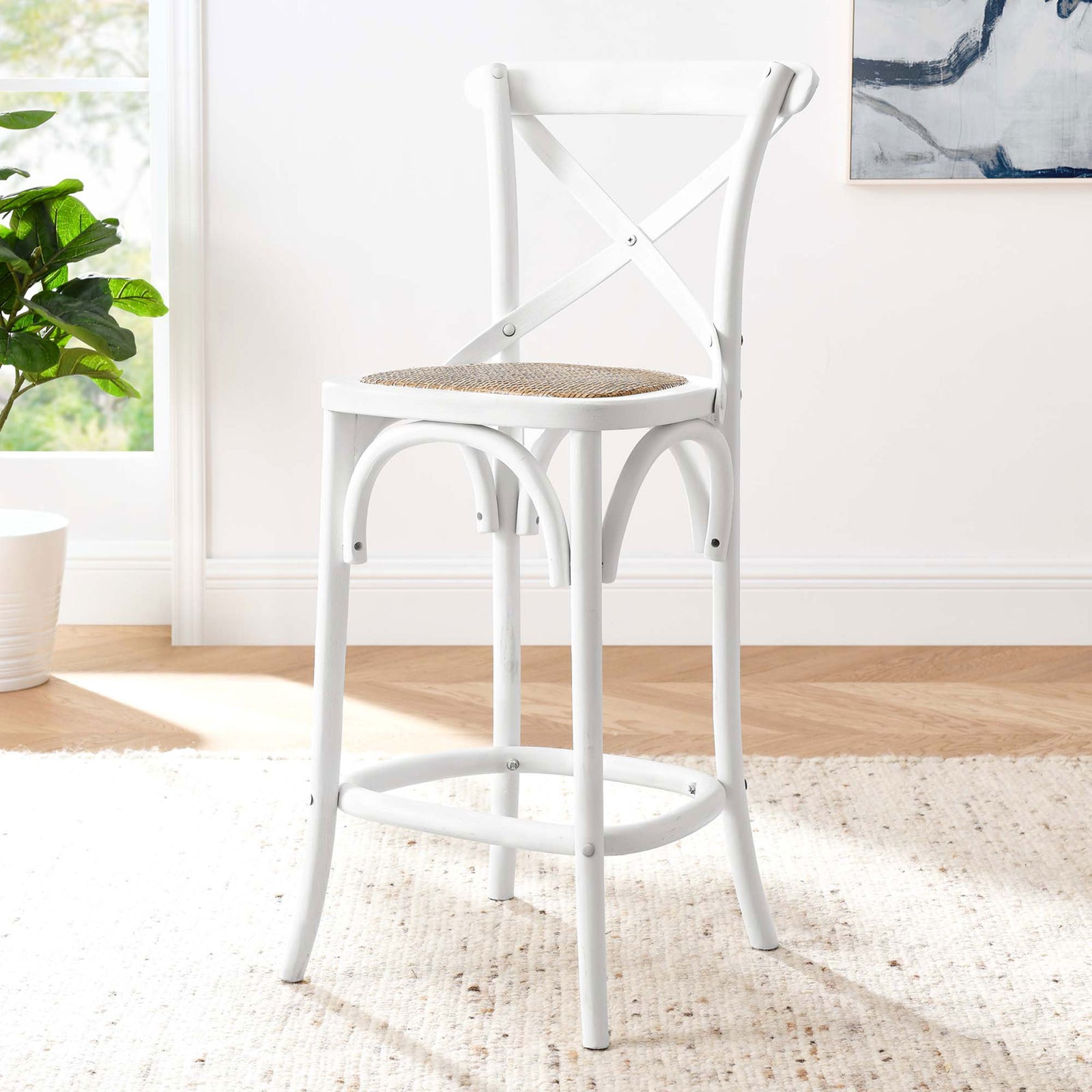 Crisp white counter stool elevates the kitchen with natural rattan and graceful curves. || EEI-5667-WHI || front_angle_room