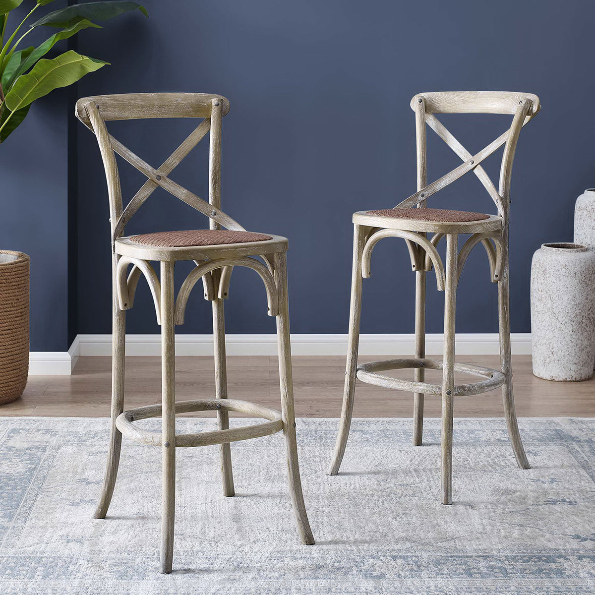 Elevate your bar area with weathered gray seating that pairs a curved footrest and handwoven rattan seat || EEI-5668-GRY || front_angle_room