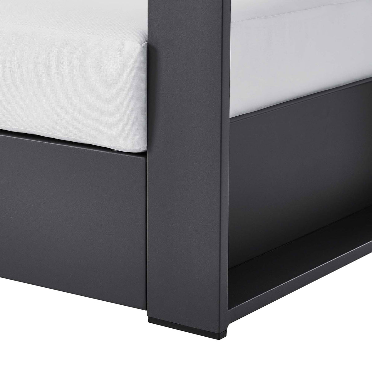 Detail of Tahoe armchair leg showing smooth charcoal aluminum base with protective foot glides || EEI-5675-GRY-WHI || leg_studio
