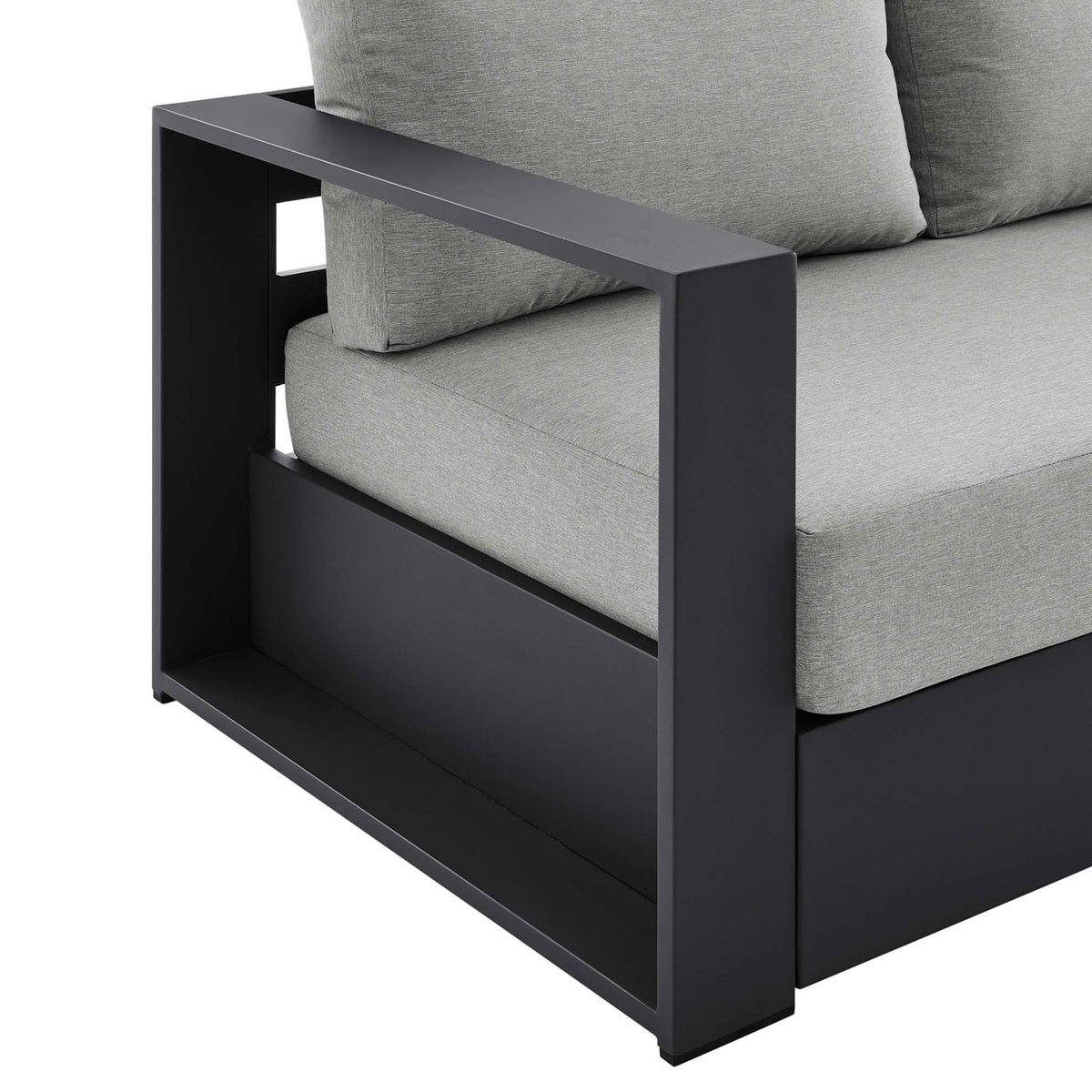Detail of the Tahoe sofa arm shelf with matte charcoal finish and finely tailored cushions. || EEI-5676-GRY-GRY || detail_studio