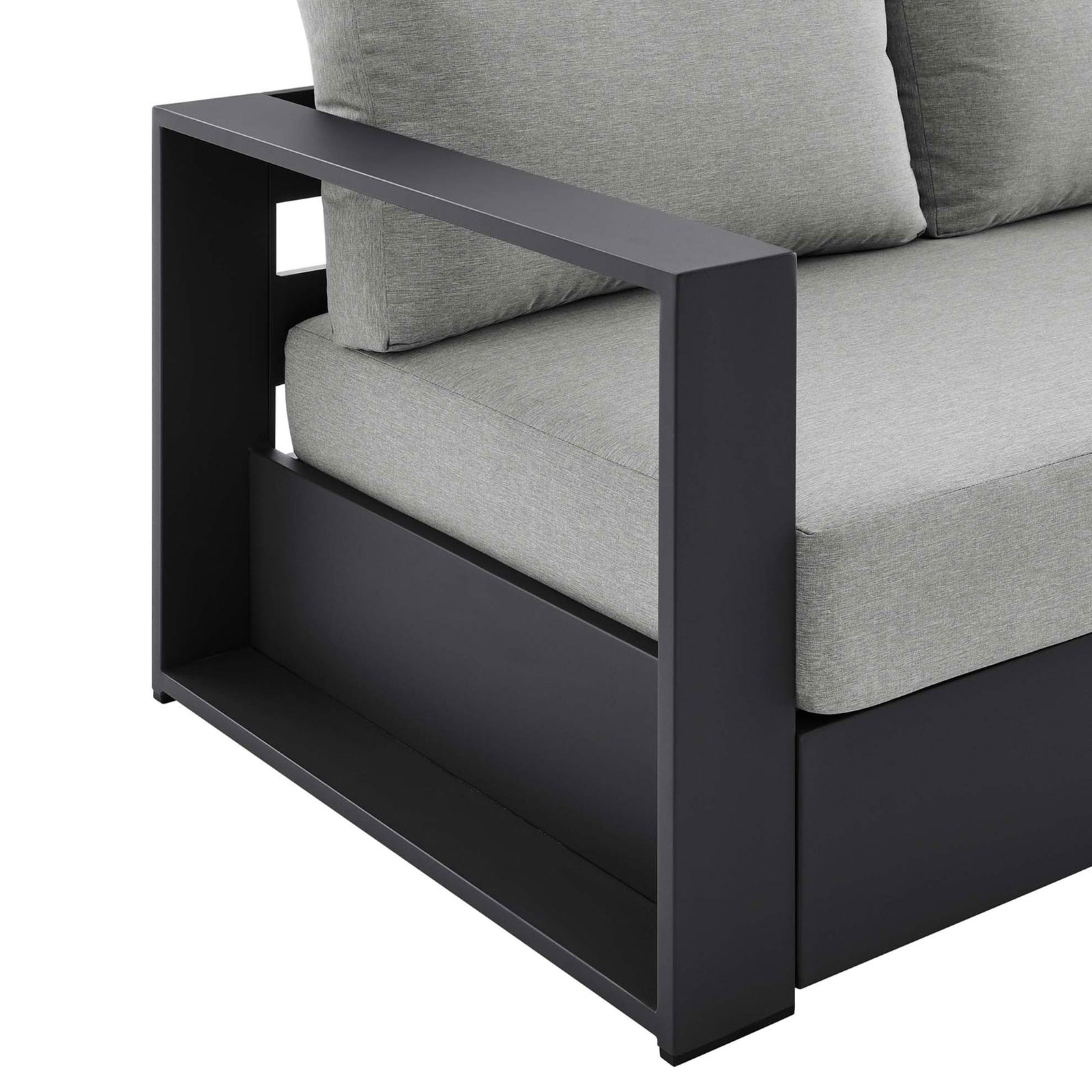 Detail of the Tahoe sofa arm shelf with matte charcoal finish and finely tailored cushions. || EEI-5676-GRY-GRY || detail_studio