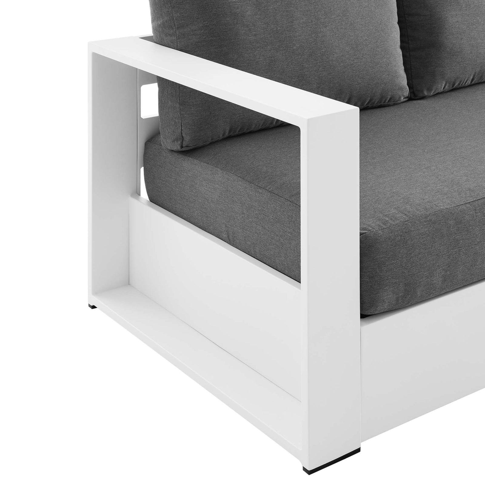Detail of the Tahoe sofa arm shelf, featuring smooth white aluminum and structured cushions. || EEI-5676-WHI-CHA || detail_studio