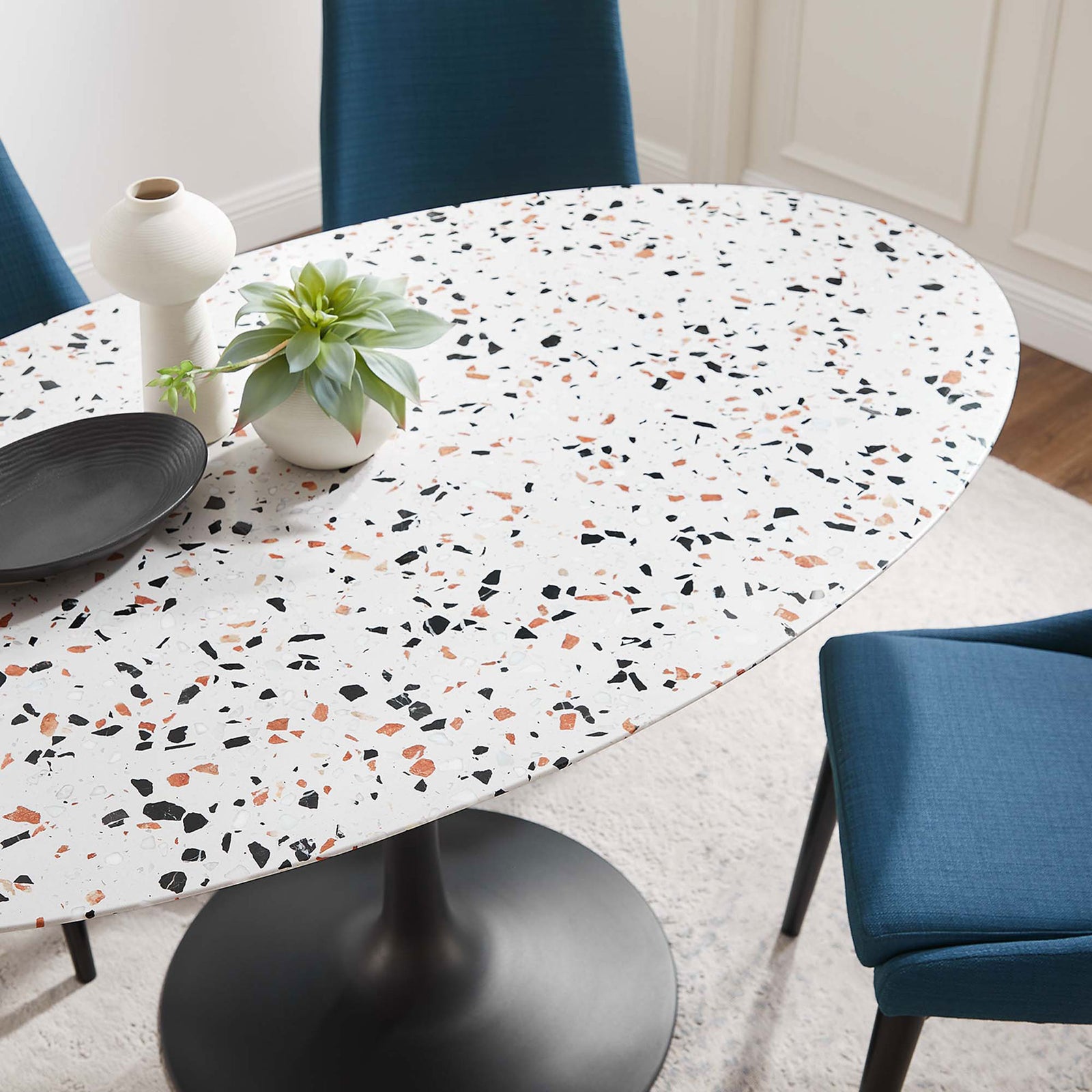 Speckled terrazzo tabletop layers color and pattern into your dining room while keeping the look clean and modern || EEI-5737-BLK-WHI || detail_room