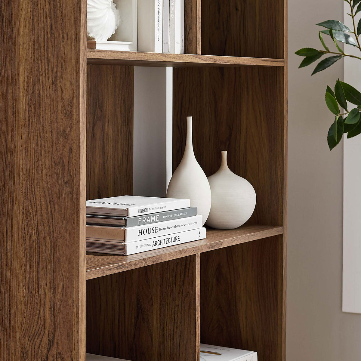 Styled shelves highlight the staggered layout, ideal for books and decor in a modern setting || EEI-5743-WAL || detail_room