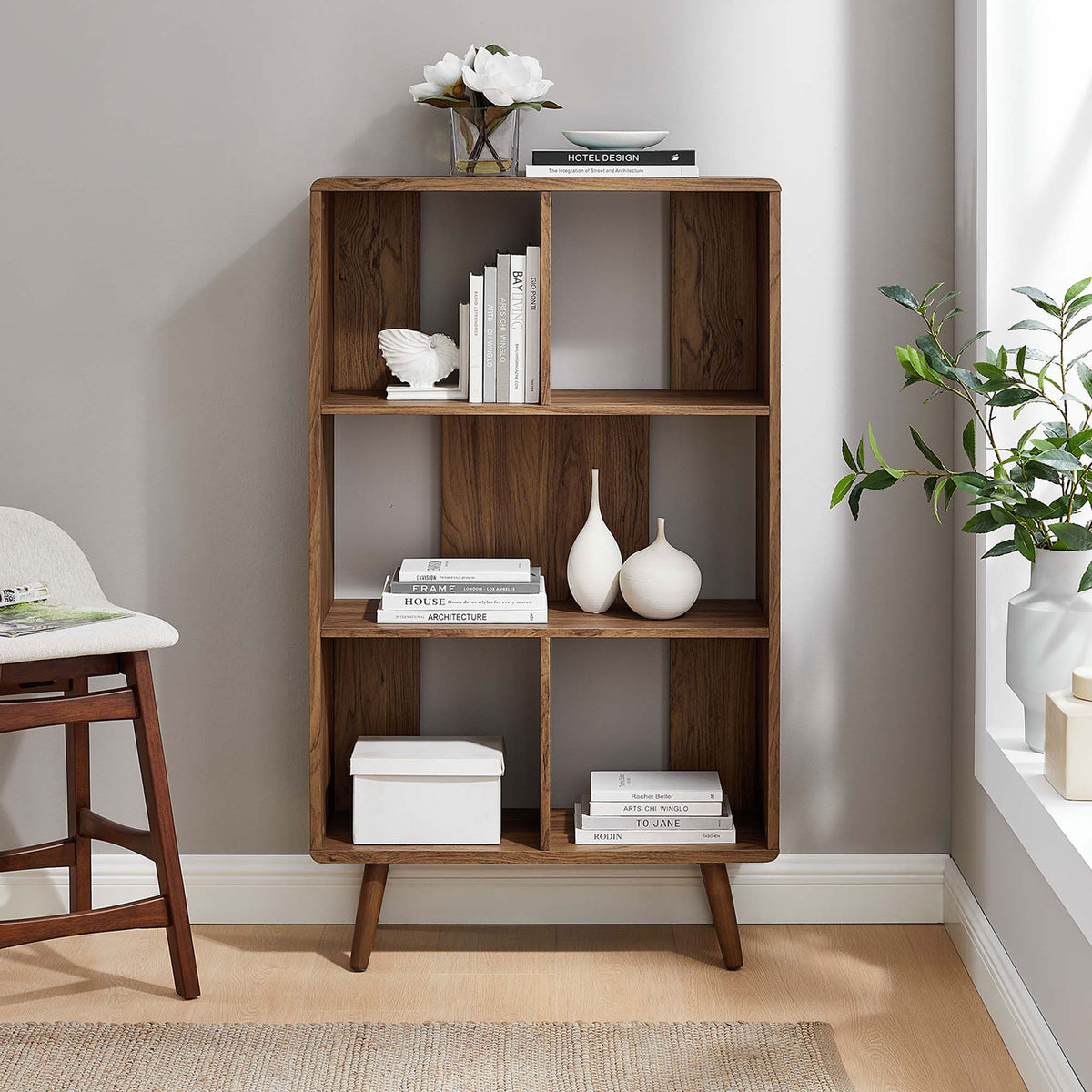 Mid-century walnut bookcase elevates any room with five open display shelves and clean lines || EEI-5743-WAL || front_room