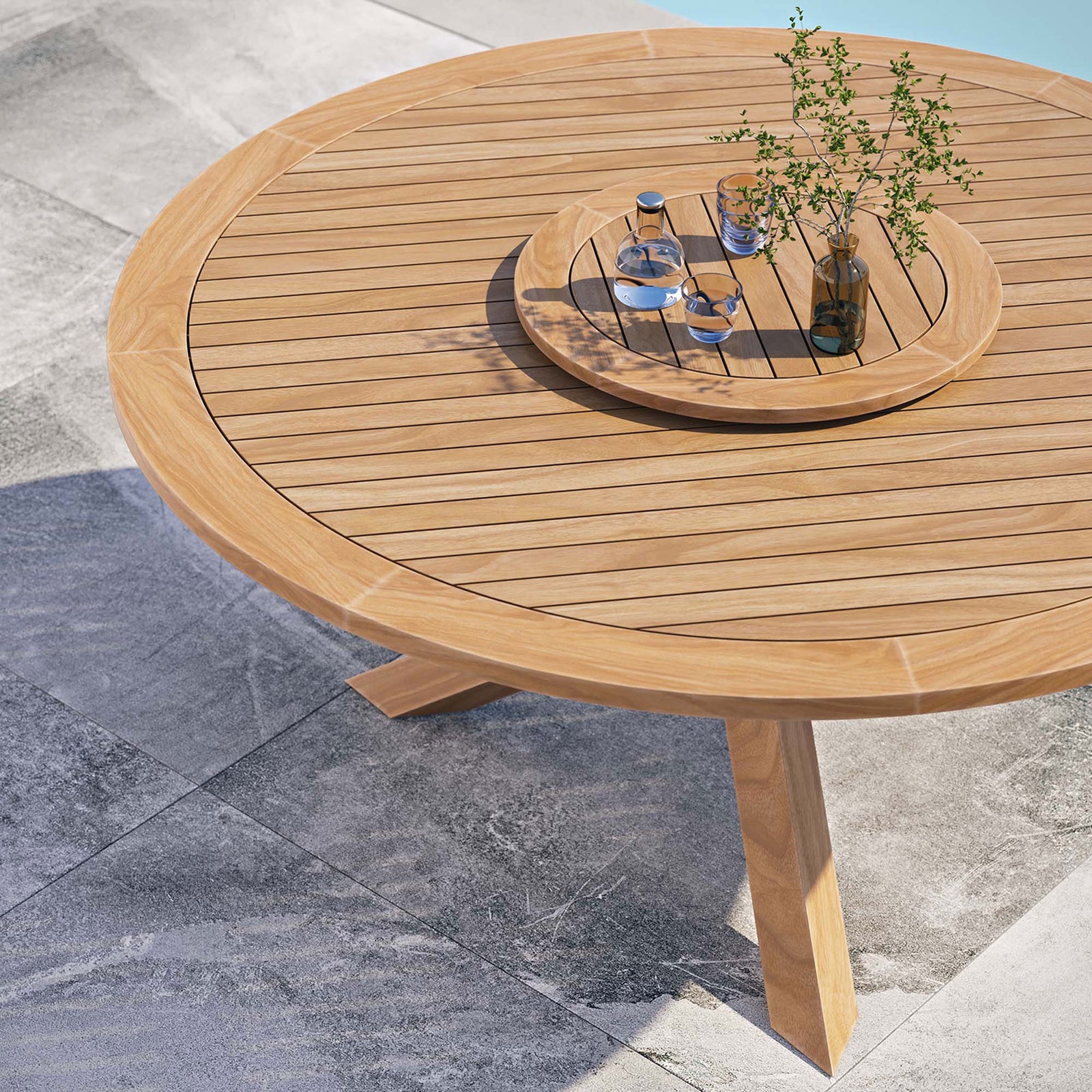 Lifestyle view of the slatted teak tabletop and lazy Susan arranged with drinks || EEI-5745-NAT || detail_room