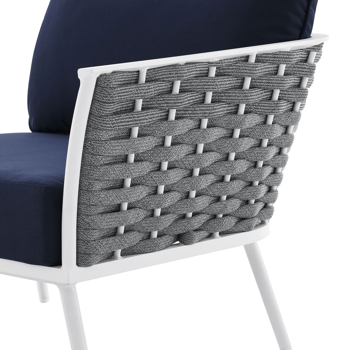 Textured gray rope along the side contrasts with the rich navy cushions and bright white metal frame. || EEI-5753-WHI-NAV || detail_studio