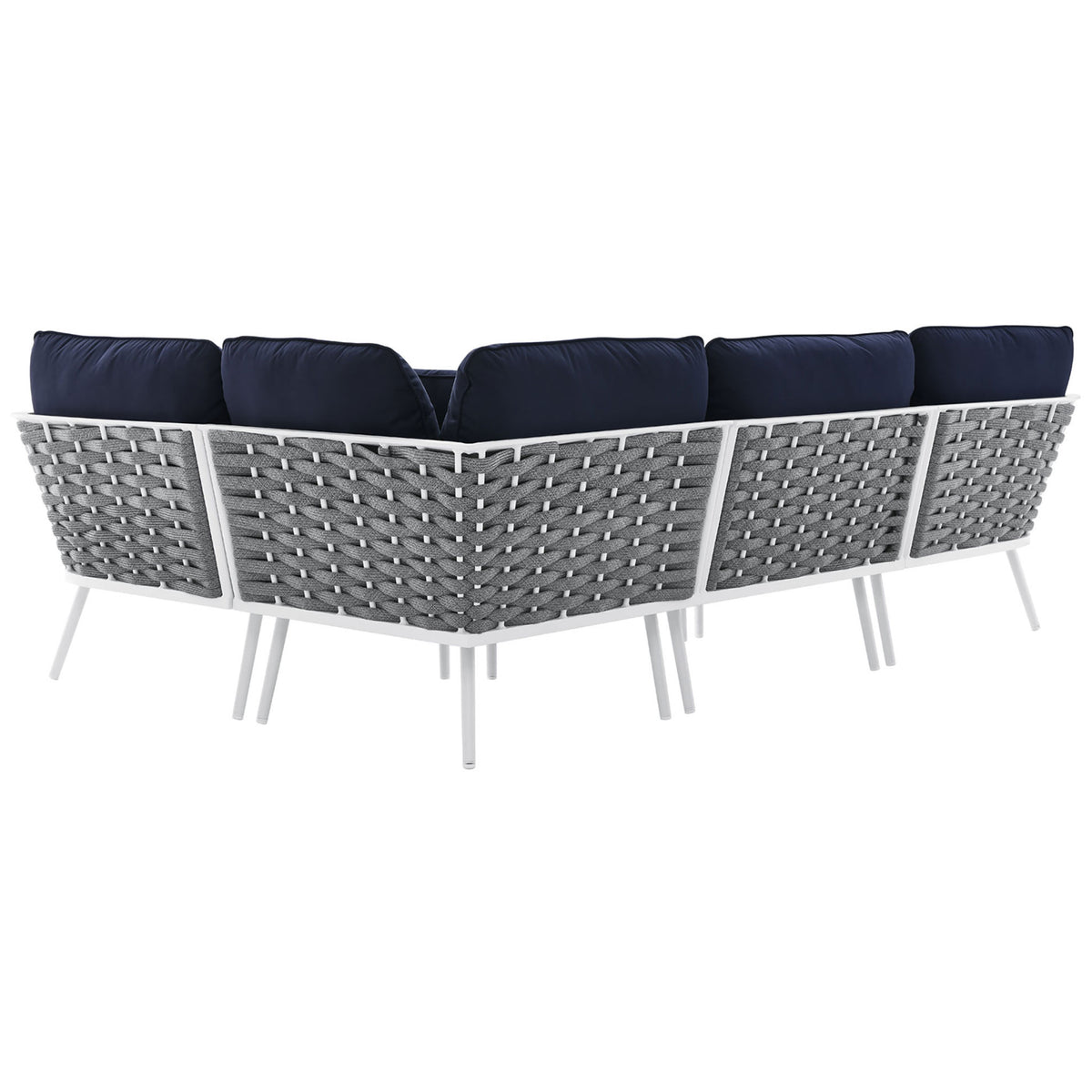 Back of the navy sectional reveals a continuous rope weave and sturdy powder coated aluminum construction. || EEI-5753-WHI-NAV || back_angle_studio