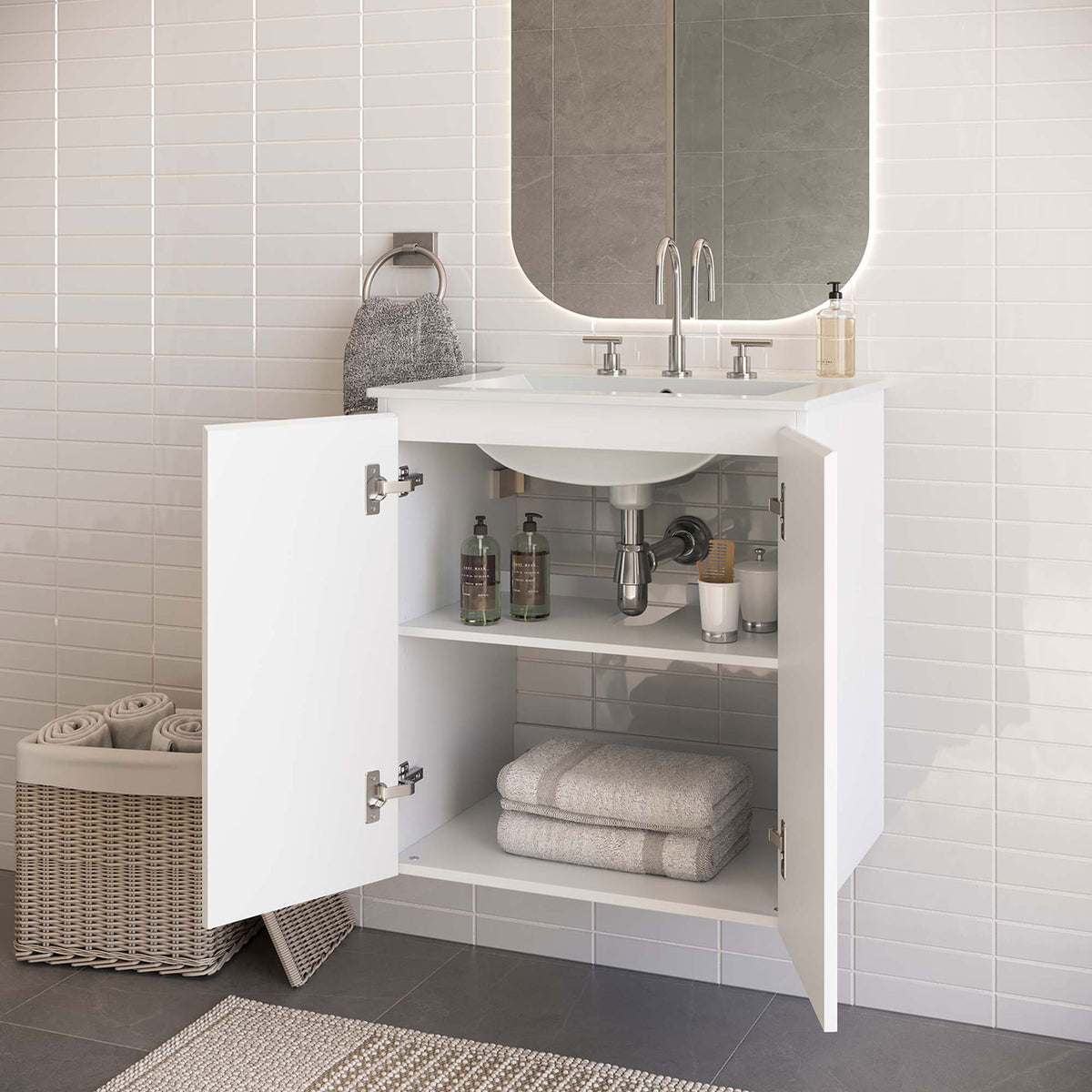 Open cabinet reveals organized storage and plumbing access beneath the 24-inch floating sink || EEI-5777-WHI-WHI || front_angle_open_room