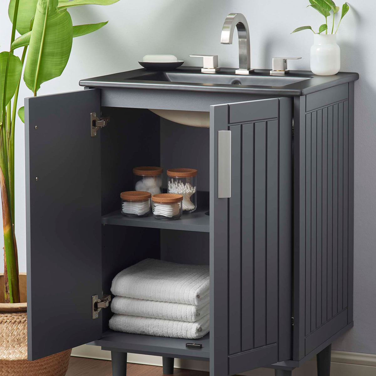 Everyday essentials fit neatly inside spacious shelves behind soft-close doors || EEI-5800-GRY-BLK || front_angle_open_room