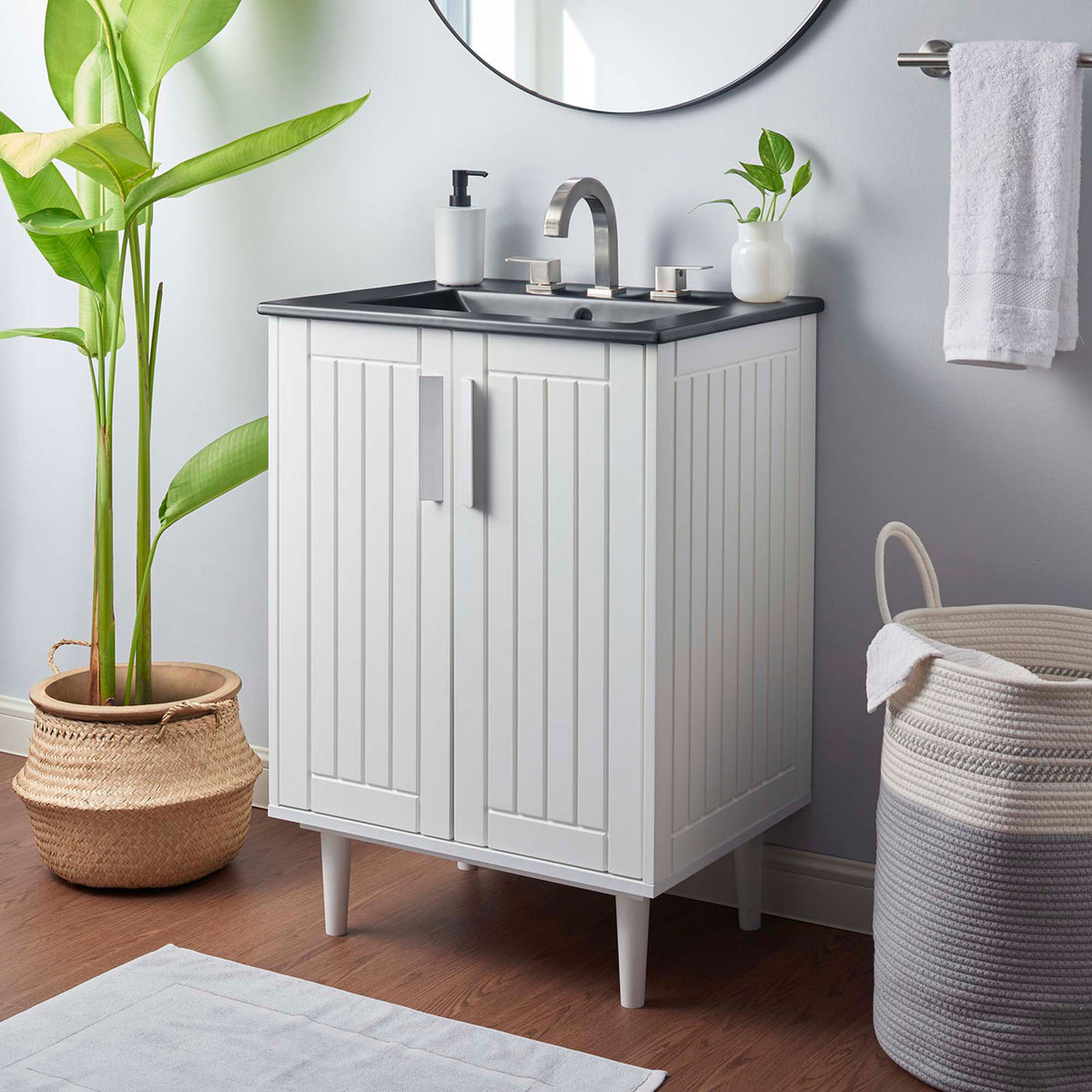 Transitional vanity brings contrast and charm to the bath with white cabinet and black sink || EEI-5800-WHI-BLK || front_angle_room