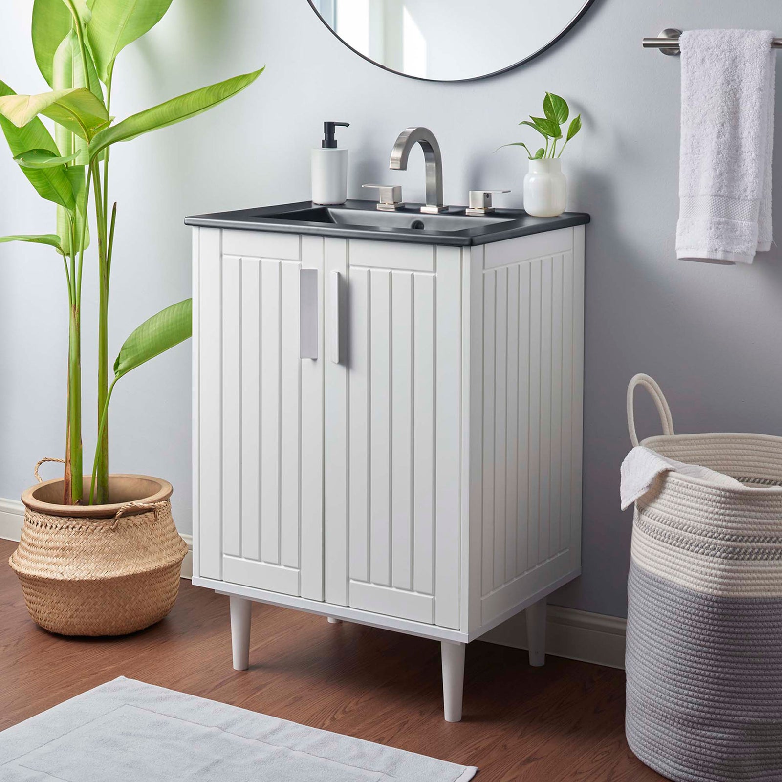 Transitional vanity brings contrast and charm to the bath with white cabinet and black sink || EEI-5800-WHI-BLK || front_angle_room