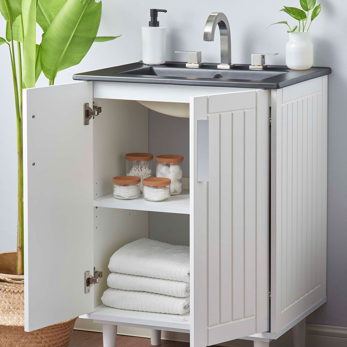 Everyday essentials fit neatly inside two shelves for an organized bath || EEI-5800-WHI-BLK || front_angle_open_room