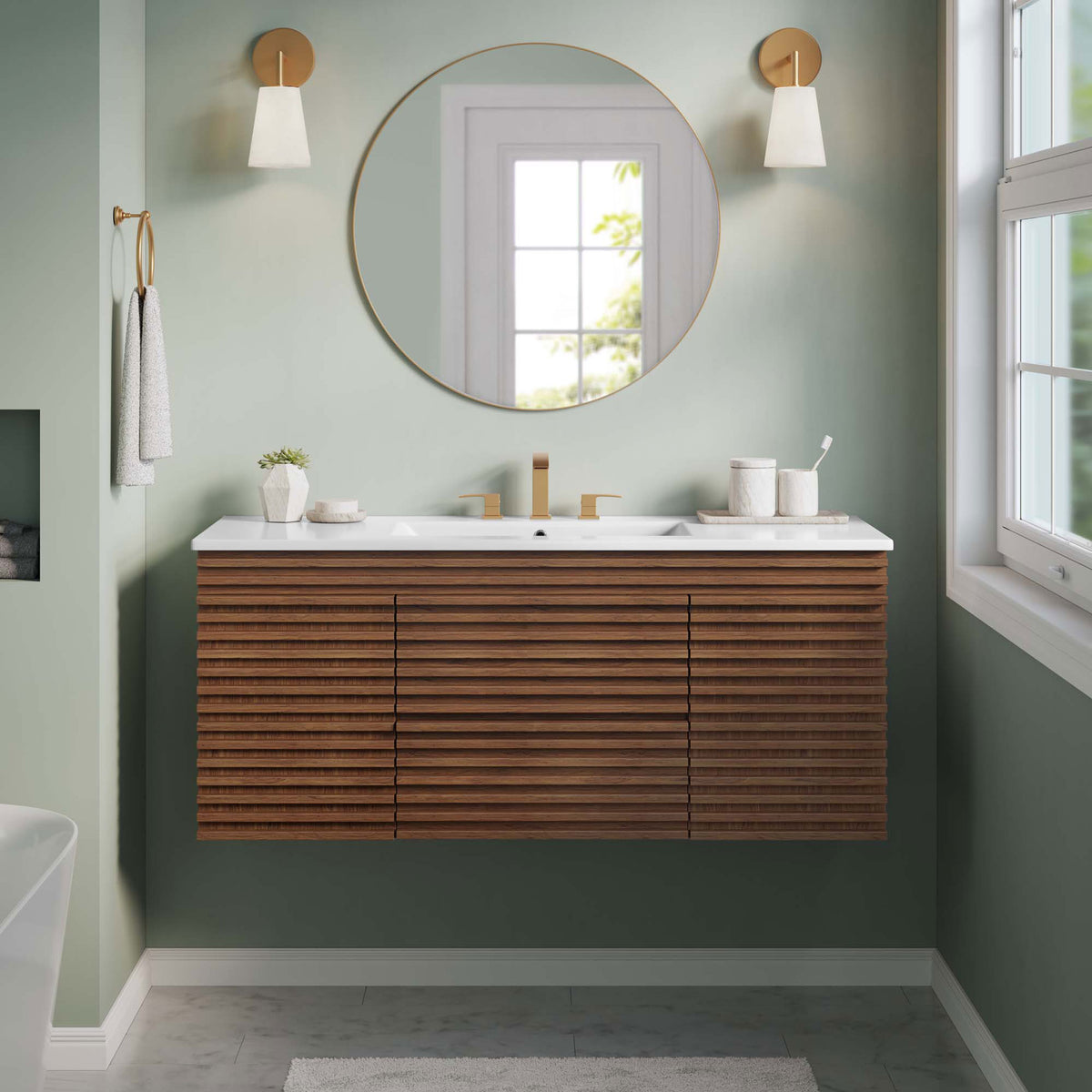 Sleek floating vanity elevates the bath with warm walnut slats and a crisp white integrated sink || EEI-5801-WAL-WHI || front_room
