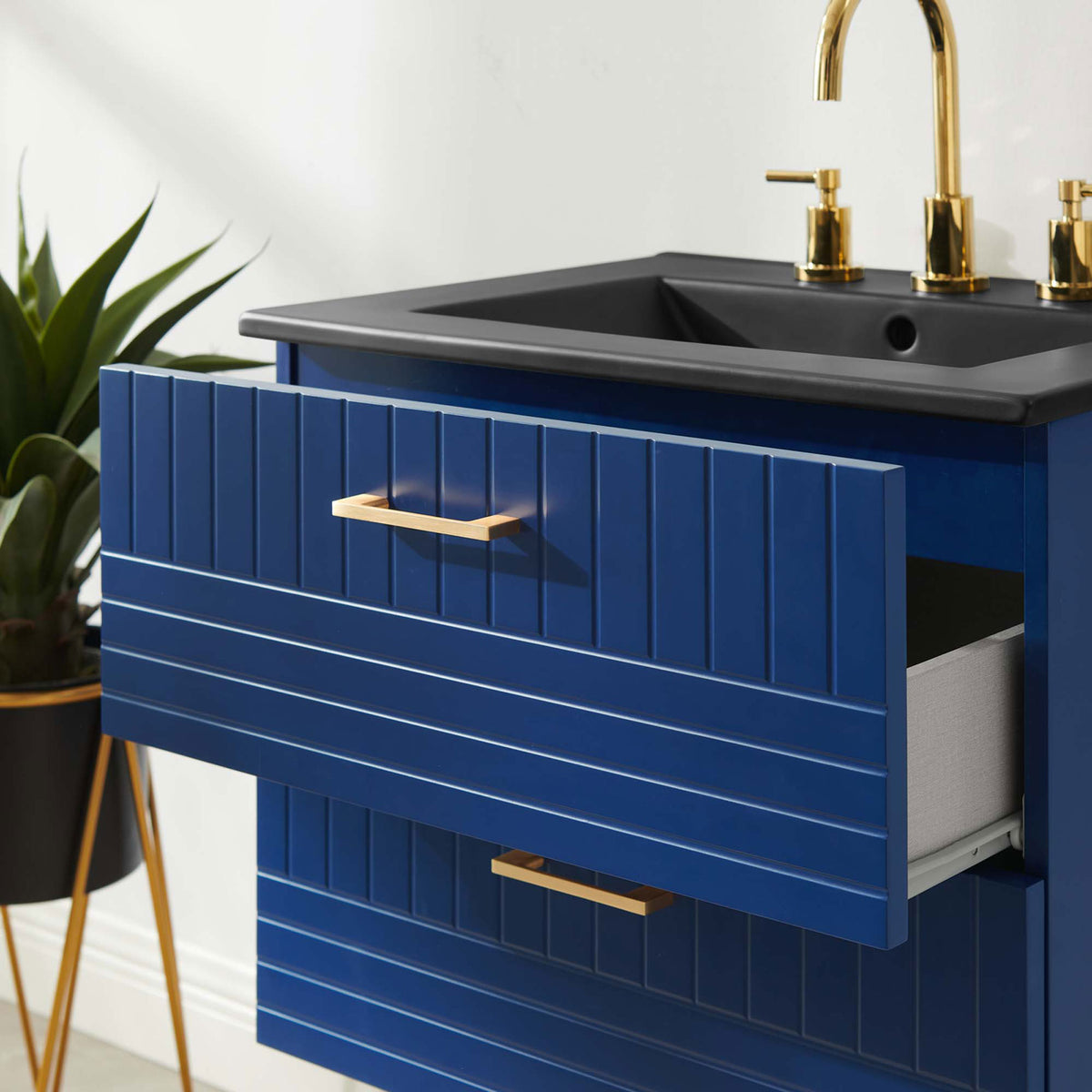 Wall-mounted design saves floor space while smooth-glide drawers keep essentials organized. || EEI-5820-BLU-BLK || front_angle_open_room