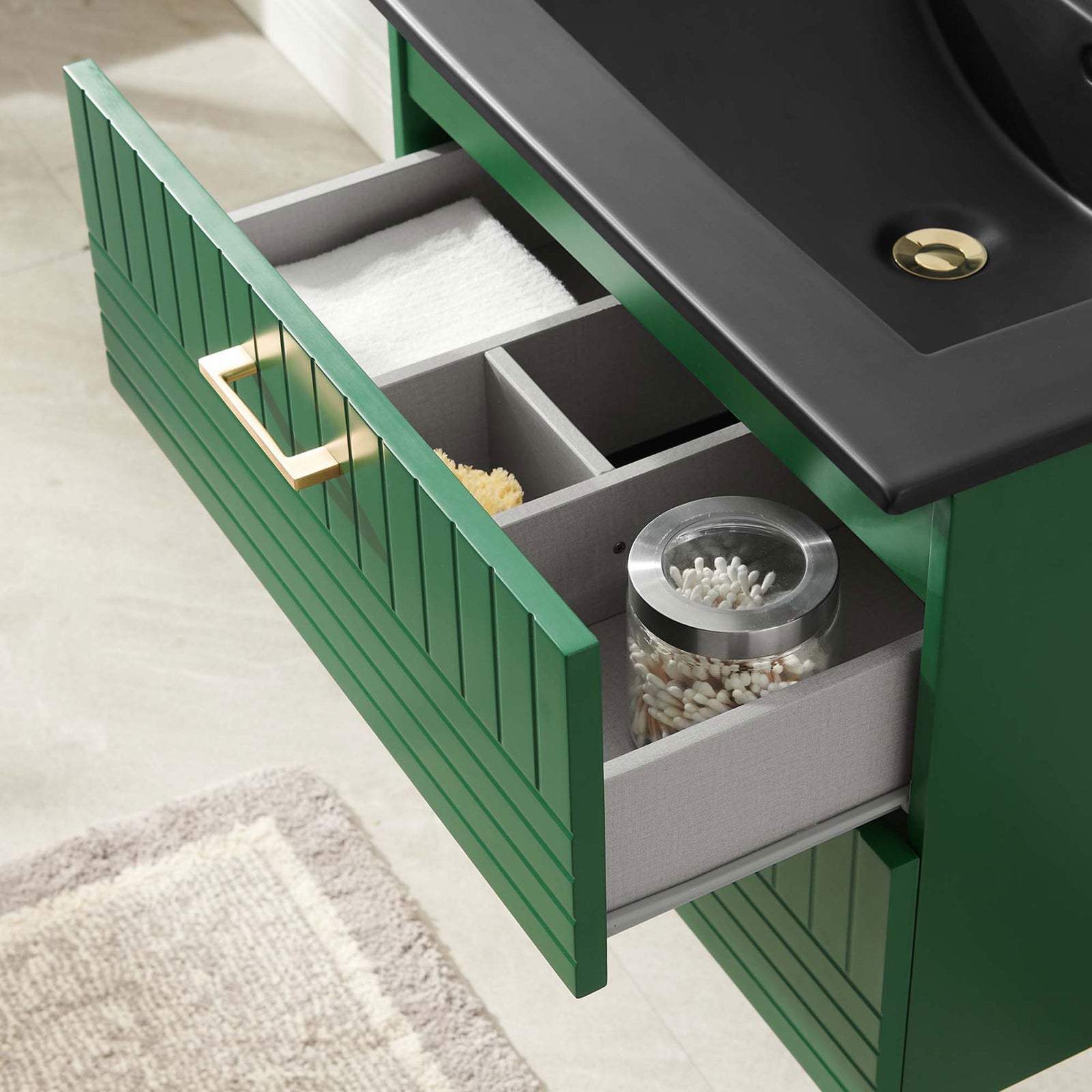 Segmented organizer compartments keep everyday essentials tidy inside the top vanity drawer. || EEI-5820-GRN-BLK || storage_open_room