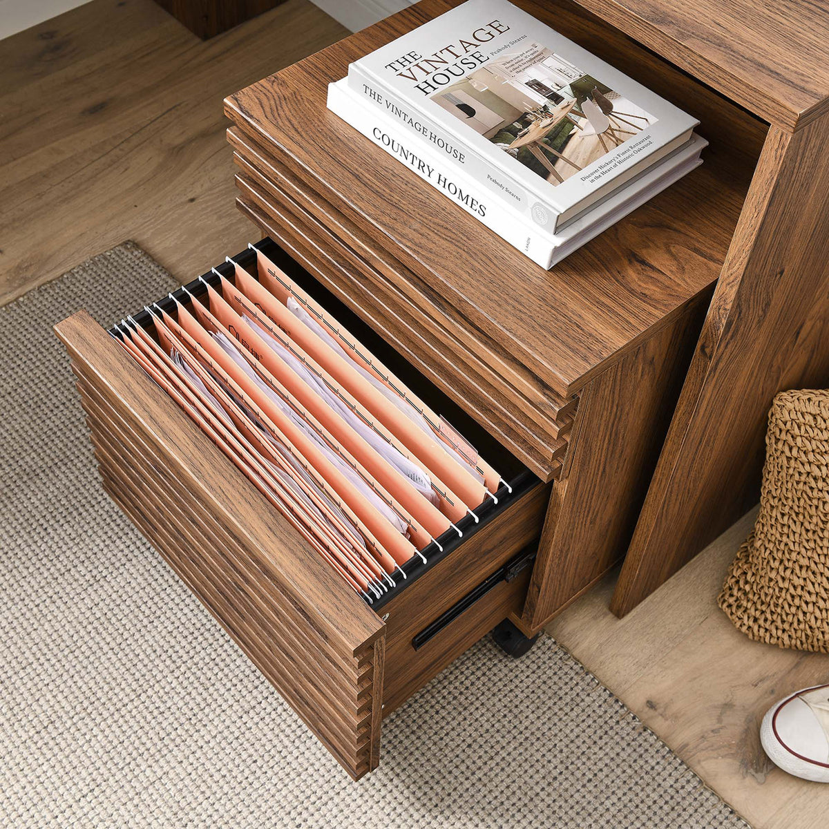 File drawer accommodates hanging folders for streamlined paperwork organization. || EEI-5821-WAL || storage_open_room