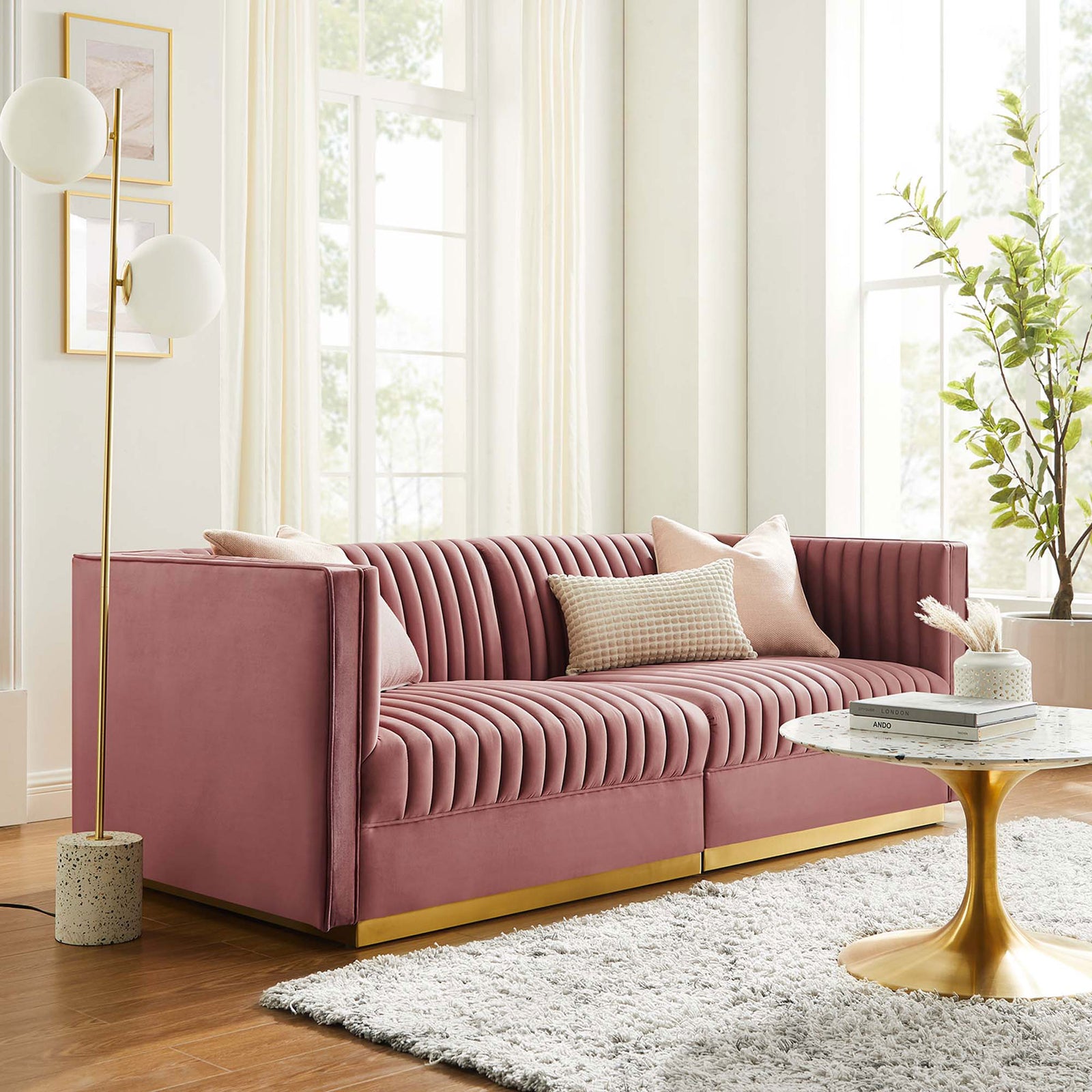 Dusty rose velvet channel tufted loveseat styled with pillows in a bright living room with gold accents || EEI-5824-DUS || front_room