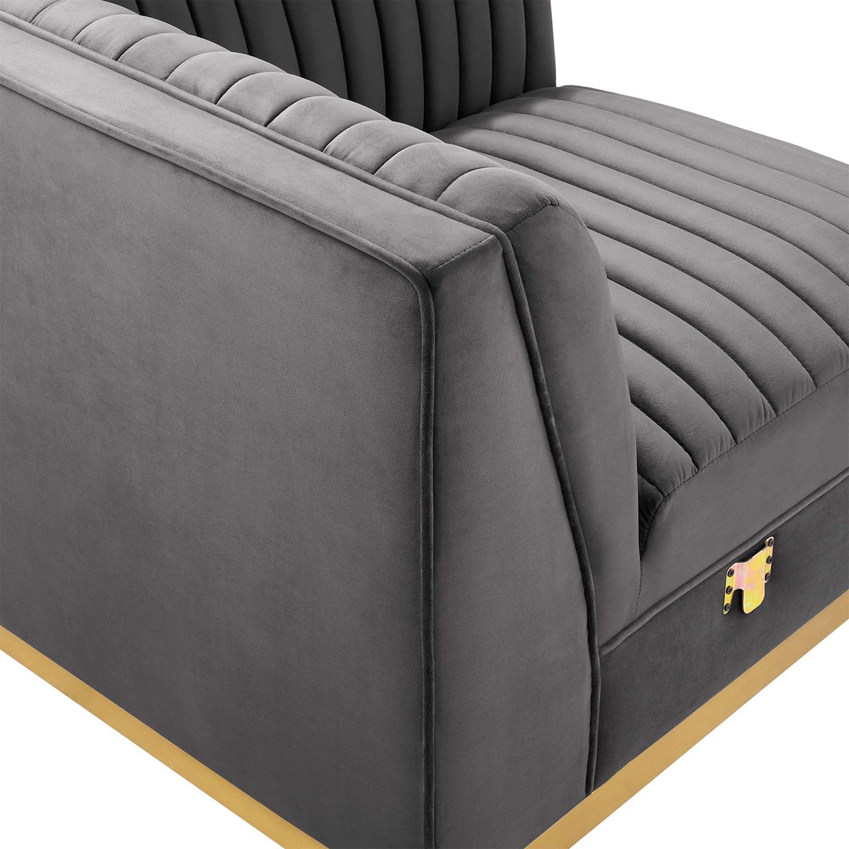 Gray velvet modular sofa section highlighting plush channel tufting and integrated metal connector hardware. || EEI-5841-GRY || detail_studio