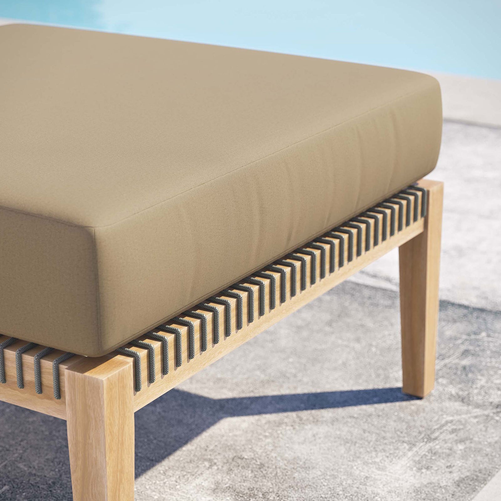 Light brown cushion teak ottoman styled poolside to showcase its coastal outdoor character || EEI-5854-GRY-LBR || detail_room