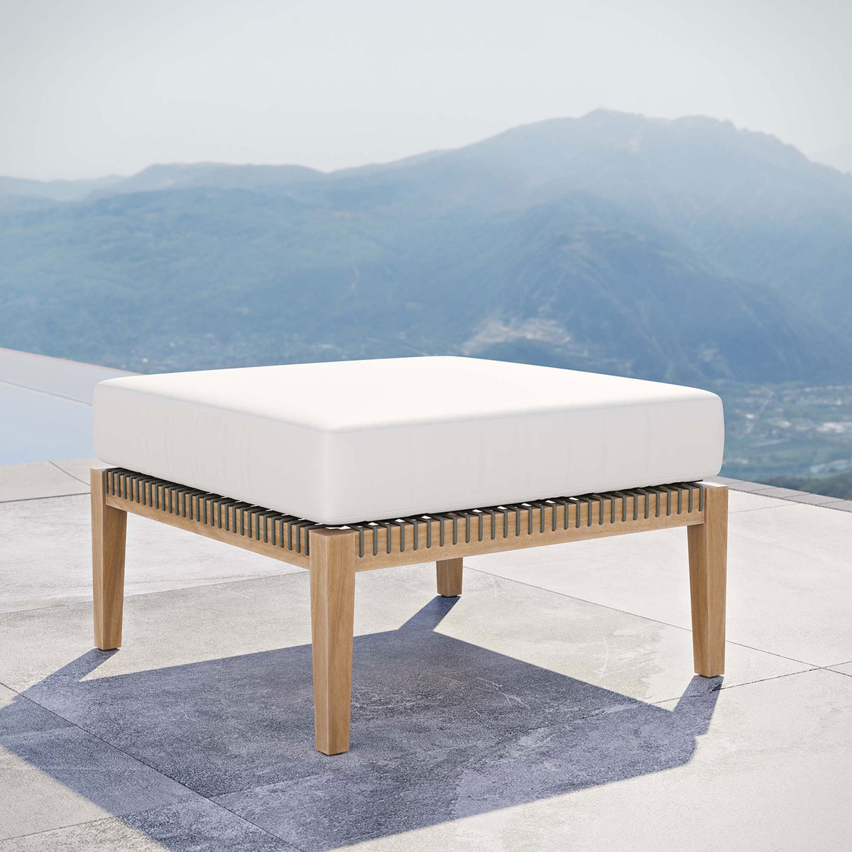 White cushion teak patio ottoman facing sweeping views to create a serene outdoor retreat || EEI-5854-GRY-WHI || front_angle_room