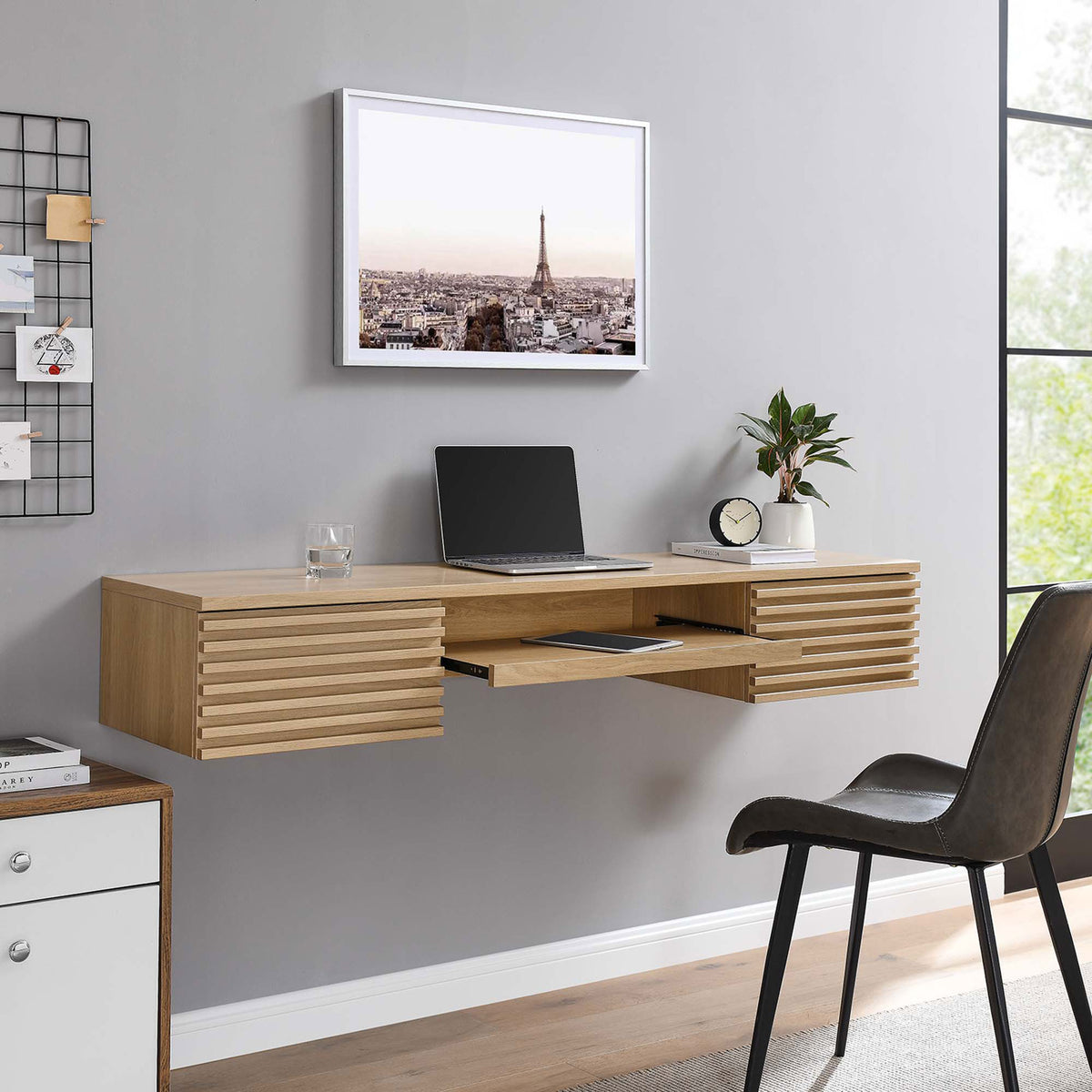Floating oak desk with slatted drawers and extended tray creates a clean, modern workstation. || EEI-5865-OAK || front_angle_open_room