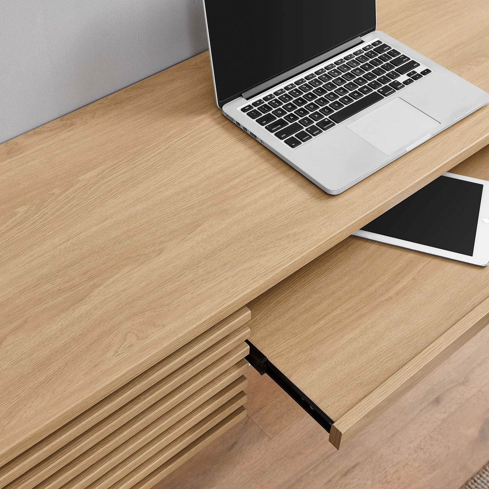 Keyboard tray glides smoothly to keep laptops and tablets within easy reach. || EEI-5865-OAK || storage_open_room