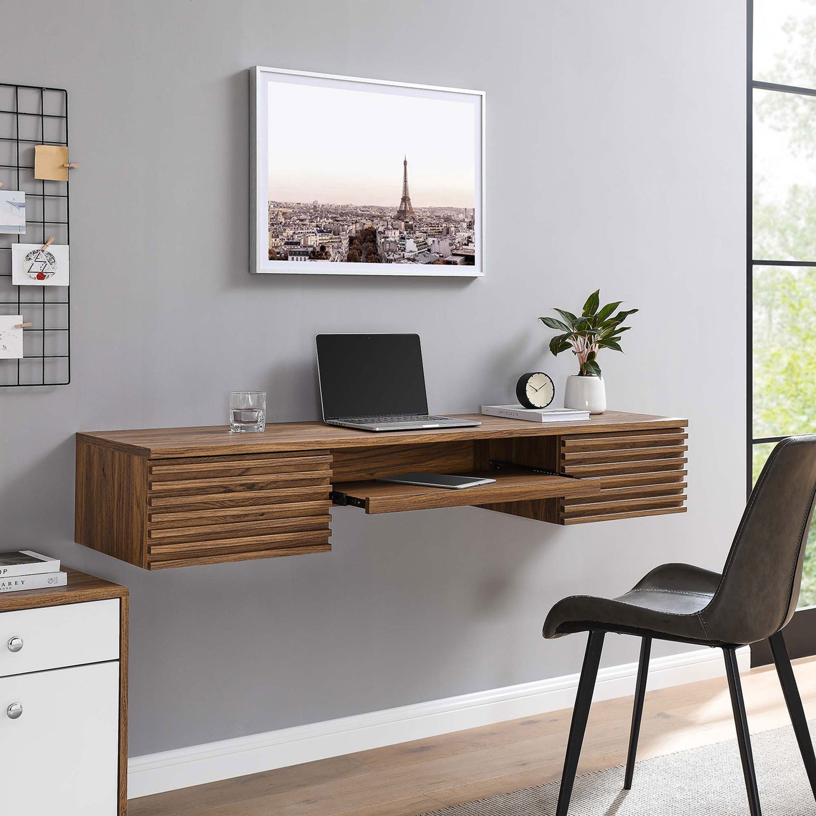 Elevated workspace adds mid-century warmth and frees up floor space in a modern home office. || EEI-5865-WAL || front_angle_room
