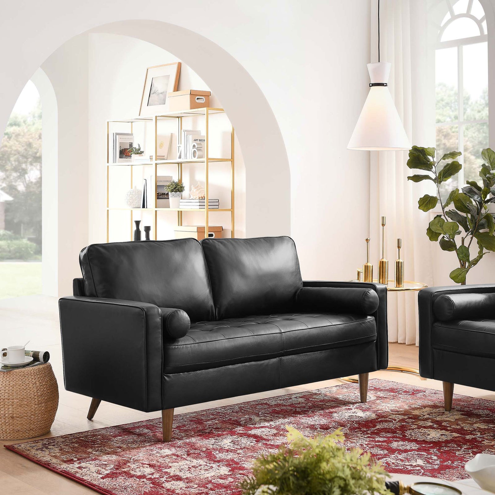 Black leather loveseat on a red area rug in a bright modern living room || EEI-5870-BLK || front_angle_room