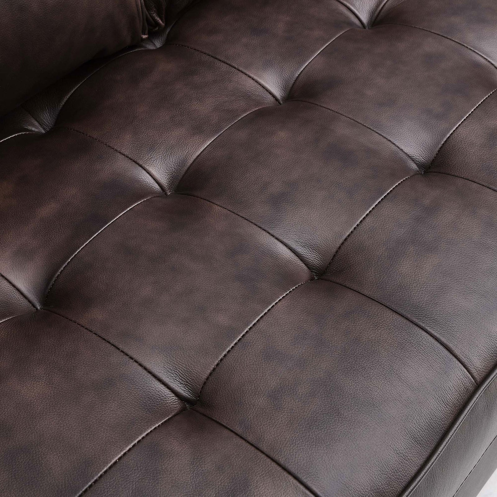 Close-up of tufted brown leather upholstery highlighting texture and stitching || EEI-5870-BRN || swatch_studio