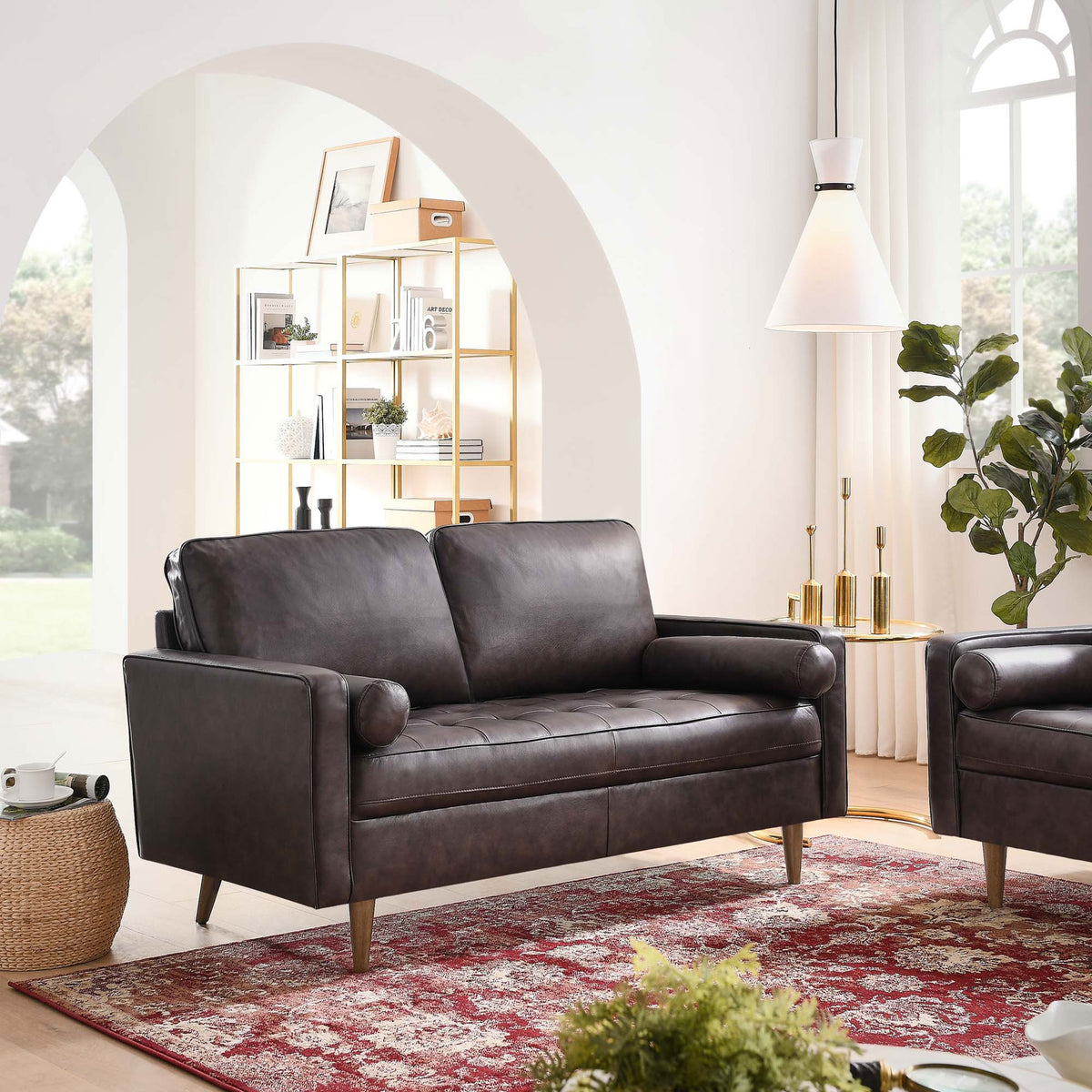 Brown leather loveseat creating a cozy focal point in a bright, airy living room || EEI-5870-BRN || front_room